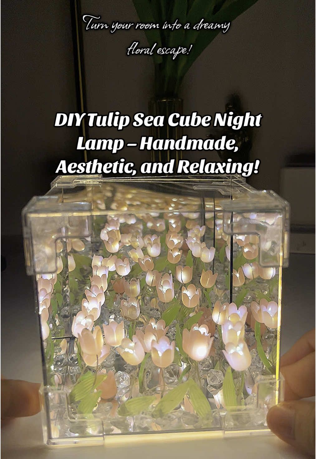 Turn your room into a dreamy floral escape! This DIY Tulip Sea Cube Lamp is the perfect relaxing project and aesthetic decor all in one. Handmade, heartfelt, and hella cute. #diynightlamp #tulipcubelamp #roomaesthetic #lampkit #cuteroomdecor #GiftIdeas #diyroomdecor #aestheticlighting #craftwithme #nightlamp #nightlampideas #tuliplamp #tuliplamptiktokshop #mirrorlamp #tuliplampgift #tuliplampmirror #diycraft #diycrafts #tulipcube #warmnight 
