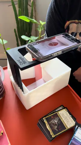 What’s did we find in the chaff this time? Get the all new and improved Card Slinger 5.0 today! Now with sliding drawer for easy card access, 9 color accents, and cute little feet! The Card Slinger is a first of its kind device to help you scan in un sleeved and sleeved MTG and TCG cards using scanning apps like ManaBox. Available for purchase or free 3d file download to print your own! Links in bio! #cardslinger #manabox #scan #scanner #mtgscanner #3dprinted #mtg #magicthegathering #mtgcommunity #mtgcommander #mtgaddicts #mtgcards #magic #mtglife #tcg #mtgart #edh #mtgedh #mtgcollection #mtgcard #mtgdaily #magicthegatheringcards #wizardsofthecoast #wotc #mtgarena #commander #mtgaddict #mtgalter