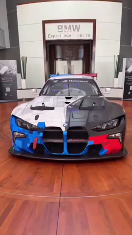The BMW M4 GT3 EVO is a high-performance racing car developed by BMW M GmbH, designed specifically for endurance racing and GT competitions. Building on the success of its predecessor, the BMW M6 GT3, the M4 GT3 EVO represents a new era in BMW's motorsport efforts, combining advanced technology, aerodynamics, and performance to compete at the highest levels of motorsport. ▎History of Creation The development of the BMW M4 GT3 began in 2019, following the introduction of the BMW M4 road car. The goal was to create a race car that would not only be competitive on the track but also provide teams with an effective and reliable platform for various GT racing series worldwide. The M4 GT3 made its debut in 2020, with extensive testing and development carried out in collaboration with professional racing teams. The car was designed to comply with the FIA GT3 regulations, which allow for a wide range of modifications while maintaining a balance of performance across different manufacturers. In 2021, BMW unveiled the M4 GT3 at the 24 Hours of Daytona, showcasing its capabilities and design. The car has since participated in various prestigious racing events, including the IMSA WeatherTech SportsCar Championship and the European Le Mans Series. ▎Technical Specifications The BMW M4 GT3 EVO features several advanced technologies and specifications that make it a formidable competitor on the racetrack: • Engine:    • 3.0L inline-six twin-turbocharged engine   • Power output: Approximately 500 hp (depending on balance of performance regulations)    • Transmission:    • 7-speed sequential gearbox    • Chassis:    • Lightweight carbon-fiber monocoque chassis    • Weight:    • Minimum weight of around 1,300 kg (2,866 lbs) as per GT3 regulations    • Aerodynamics:    • Active aerodynamics with adjustable front and rear wings   • Enhanced downforce and stability at high speeds    • Suspension:    • Double-wishbone suspension setup for improved handling and cornering performance    • Brakes:    • Carbon-carbon brake discs for optimal stopping power ▎Design and Features The design of the BMW M4 GT3 EVO is heavily influenced by BMW's signature styling cues, featuring aggressive lines and a prominent kidney grille. The car is equipped with a large rear wing and front splitter to enhance aerodynamics and downforce. Inside the cockpit, the focus is on driver ergonomics and functionality. The dashboard is equipped with advanced telemetry systems that provide real-time data to drivers and engineers, allowing for precise adjustments during races. ▎Legacy and Impact The BMW M4 GT3 EVO has quickly established itself as a competitive force in the GT racing scene. With its blend of performance, reliability, and cutting-edge technology, it has garnered attention from teams around the world. As part of BMW's commitment to motorsport, the M4 GT3 EVO continues to evolve through ongoing development and feedback from drivers and teams. Its success on the track not only reinforces BMW's heritage in racing but also contributes to the brand's reputation for engineering excellence. In conclusion, the BMW M4 GT3 EVO is more than just a racing car; it embodies BMW's passion for motorsport and innovation, pushing the boundaries of performance in the world of GT racing. #auto #cars #тачки #vintagecar #sportcars #машины 