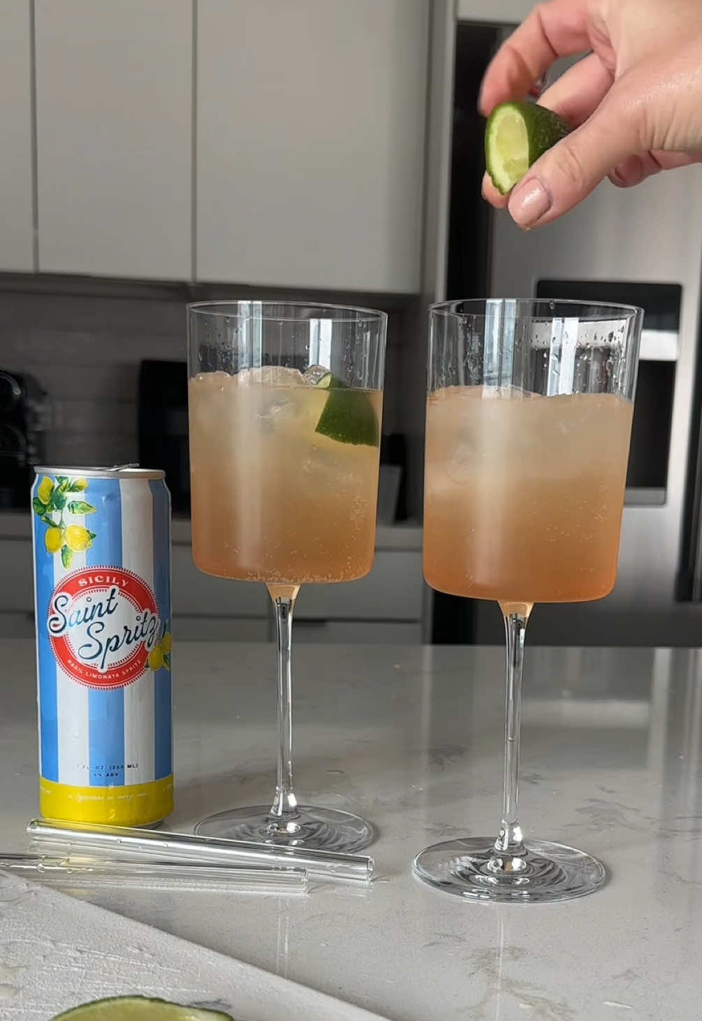 Summertime is in full effect here in Dallas. Let’s have a drink! RECIPE: Lemmon @Saint Spritz / splash of peach liqor / lime juice from lime wedge  #summertime #summerdrink #spritz #drinkresponsibily #virla #fyp #drinktok 