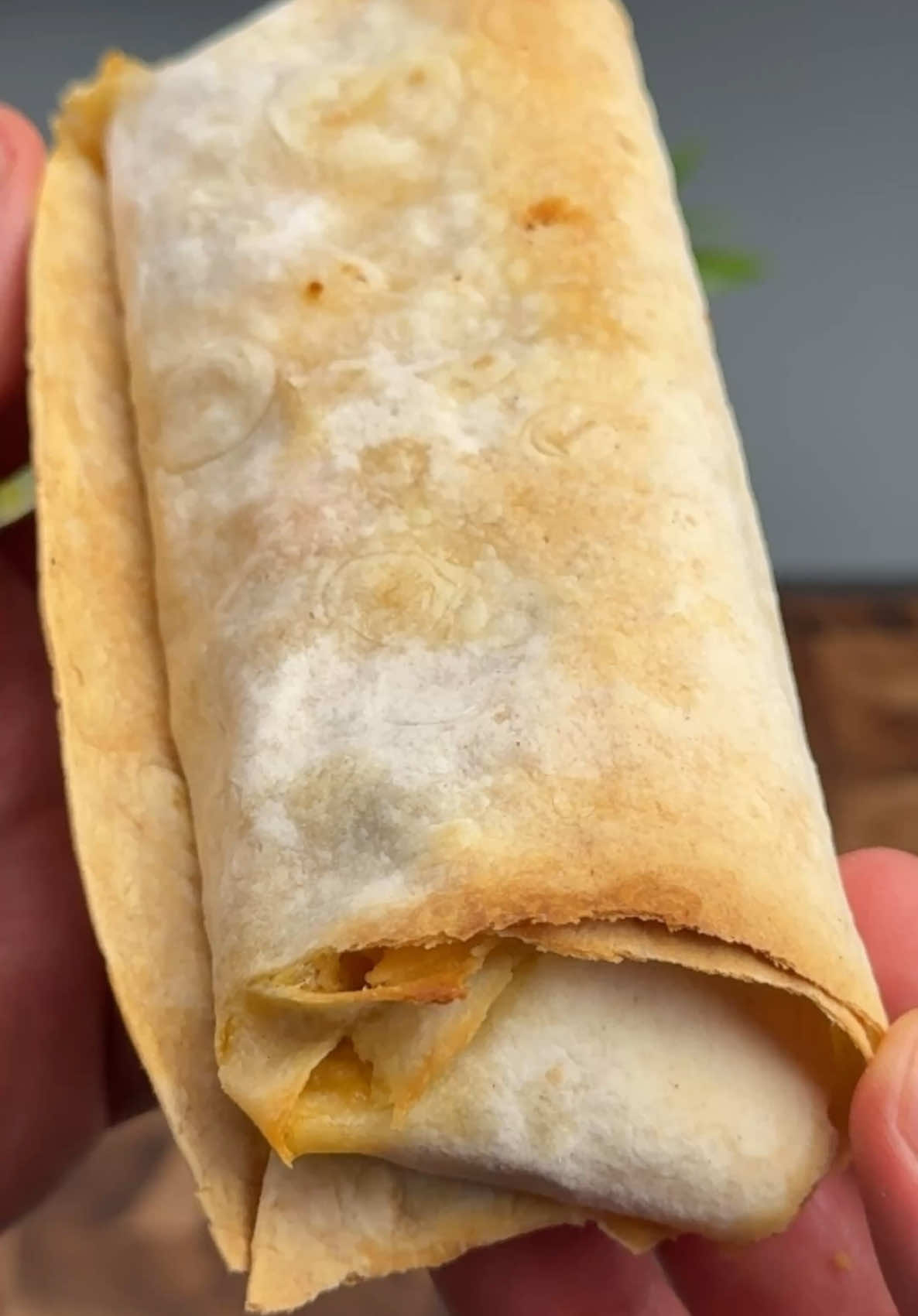 #VNVideoEditor                                           Cheese Garlic Chicken Rolls.                    Top Chef Reveals SECRET to FLAVORFUL Cheese Garlic Chicken Rolls INGREDIENTS: ●Lavash or pita bread - 6 pieces ●Chicken thigh fillet - 500 g ●Salt - 1 tsp ●Black pepper - to taste ●Smoked paprika - 1 tsp ●Dried garlic - 1 tsp ●Chicken seasoning - 1 tsp ●Vegetable oil - 3 tbsp ●Onion - 1 pc ●Bell pepper - 1 pc ●Hard cheese - 180 g Garlic sauce: ●Sour cream or yogurt - 200 g ●Mayonnaise - 4 tbsp ●Curd cheese - 1 tbsp ●Dried garlic - 1/2 tsp ●Garlic - 3 cloves ●Juice of 1/2 lemon ●Salt - 1/2 tsp ●Black pepper - to taste 1. Finely chop  the fillet of 4-5 chicken thighs, add salt, spices and one tablespoon of vegetable oil. Mix well and marinate for 20-30 minutes. 2. Cut the onion into quarter rings and fry in a preheated frying pan with vegetable oil until soft. 3. Chop the sweet pepper and add to the onion, salt, mix well and fry for another 2-3 minutes. 4. Add chicken pieces to the frying pan and fry for another 5-6 minutes. 5. For the sauce, add sour cream or yogurt, mayonnaise, cottage cheese, and dry garlic to a bowl. Grate a few cloves of garlic on a fine grater and add the juice of half a lemon. Salt and pepper to taste and mix everything well with a spoon. 6. Add fried chicken with vegetables, grated cheese to the sauce and mix well. 7. Put a few spoons of the resulting mixture on the pita bread and wrap it up. 8. Lightly grease with olive oil and bake in an oven preheated to 200 degrees C for 8-10 minutes. Bon appetit! The recipe in your language is available in the description, 💖🇺🇦🇵🇱🇩🇪🇺🇸🇫🇰🇪🇸🇵🇹🇮🇹🇷🇴 🇷🇸🇭🇷🇱🇻🇸🇮🇨🇿🇫🇮🇸🇪🇩🇰🇳🇴 🇯🇵 🇬🇷 🇮🇱🇰🇿🇰🇬🇱🇻🇹🇼 🇵🇪 🇦🇷 🇨🇱 🇻🇪                       #cheesygarlicrolls #chickenrecipe #chicken #simplydeliciousrecipes #EasyRecipes #tastymeals 