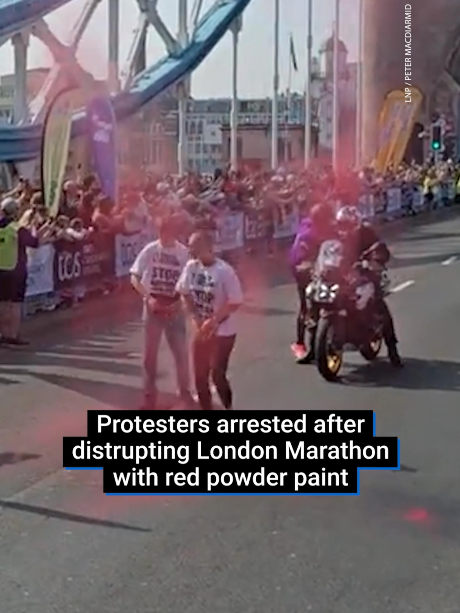 Youth Demand demonstrators threw red powder paint on Tower Bridge during the London Marathon, calling for a trade embargo on Israel. The group said two supporters jumped the barriers and threw the substance in front of the men’s elite race at around 10:35am. A photo shared by Youth Demand shows two people standing in the road wearing t-shirts reading, 'Youth Demand: Stop Arming Israel.' Police quickly arrested them. #fyp #LondonMarathon #LondonMarathon2025 #YouthDemand #TowerBridge #Israel #IsraelGaza