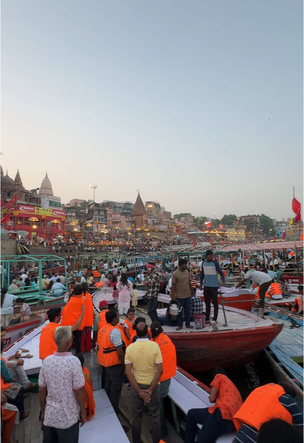 Evening Ganga Aarti festival in Varanasi filled with thousands of people in the Ganges river #india #varanasi #travel #boat #ganga