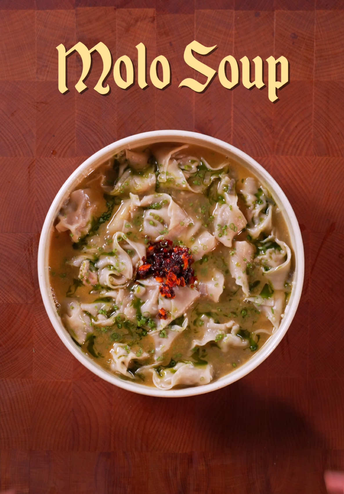 🇵🇭 Molo Soup | Soups So Good It Can Cure Any Sickness Ep. 1 This soup is my take on the famous Molo Soup from Iloilo City, Philippines! My personal favorite soup of all time especially since the family of my wife has roots in iloilo and they prepare this often 🫶 INGREDIENTS: Soup Base - 3 tbsp oil - 10 cloves garlic, chopped - 1 pc red onion, chopped - 1.5 liters pork/chicken stock - pepper to taste - ½ - 1 tbsp patis/fish sauce - reserved shrimp heads Dumplings: - 70% ground pork - 30% prawns, peeled, deveined and chopped finely - (Optional) ¼ kg crab meat - ¼ cup chopped chives - 1 tbsp garlic powder - 1 tbsp onion powder - ¼ tsp pepper - ½ tsp salt - ¼ cup oyster sauce - 1 whole jicama, diced - 1 egg for binding  - 2 dozen molo/dumpling wrappers Toppings: - chopped spring onions - Chive oil - Chili-garlic oil INSTRUCTIONS: - sauté shrimp heads in oil for around 4 mins and add chicken stock. allow to simmer for 5 mins and strain. - In a pot with hot oil, saute garlic and onion. Add shrimp/chicken stock then season with pepper and fish sauce. - Make the dumplings by mixing all the dumpling ingredients listed. Fill each wrapper with 1 tbsp of filling and fold into dumplings. - Bring stock to a boil and add dumplings. Simmer for 5 minutes until fully-cooked. #asmr #cookingasmr 