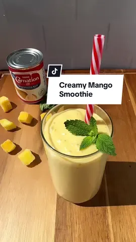 This creamy mango smoothie is a deliciously refreshing snack! 🥭 #creamy #mango #smoothie #Recipe #snackideas #evaporatedmilk #recipes #carnationmilk #carnationnation  Creamy Mango Smoothie Recipe Serves 2  Ingredients  1 1/2 cup frozen mango chunks Juice of 2 limes 1 cup mango nectar 2/3 cup Carnation Evaporated Milk 1 Tablespoon brown sugar or agave nectar (optional) How to make a creamy mango smoothie  1. Place the mango, lime juice, mango nectar, Carnation evaporated milk, and brown sugar in a blender. Blend on low then increase the speed until smooth. Pour into a glass and enjoy! 