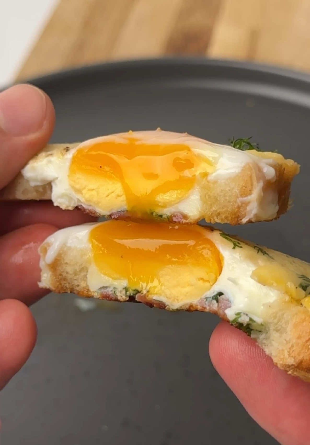 #VNVideoEditor                                         Have you tried making this breakfast?                                                   Can You REALLY Cook Breakfast Like a TOP CHEF in Just 10 Minutes? INGREDIENTS: ●Loaf or bread - 2 piece ●Butter - 10 g ●Sausage - 30g ●Tomatoes - 1/2  piece ●Eggs - 2 pcs ●Cheese - 40g ●Salt - 1/4 tsp ●Black pepper - to taste ●Water - 20 ml ●Dill - 10 g 1. Cut out the middle of two pieces of bread or a loaf with a knife. 2. Put the resulting pieces on a heated frying pan and dry until lightly browned on one side, then turn over. 3. Add a small piece of butter to the middle. 4. Put some finely chopped sausage and tomato. Then add a chicken egg to the middle of the sandwich. Try to do this quickly enough, or reduce heat to minimum. So that the bottom of the sandwich does not burn. 5. Salt the eggs and add black pepper. 6. Sprinkle some grated cheese and finely chopped dill on top of the sandwiches. 7. Add some water and cover with a lid. Cook for a few more minutes on minimum heat, then turn off the stove and, if you do not like runny yolks, wait a little longer. Bon appetit! The recipe in your language is available in the description, 💖🇺🇦🇵🇱🇩🇪🇺🇸🇫🇰🇪🇸🇵🇹🇮🇹🇷🇴 🇷🇸🇭🇷🇱🇻🇸🇮🇨🇿🇫🇮🇸🇪🇩🇰🇳🇴 🇯🇵 🇬🇷 🇮🇱🇰🇿🇰🇬🇱🇻🇹🇼 🇵🇪 🇦🇷 🇨🇱 🇻🇪                                           #egg #eggrecipe #perfecteggs #breakfast #simplydeliciousrecipes #sandwich 