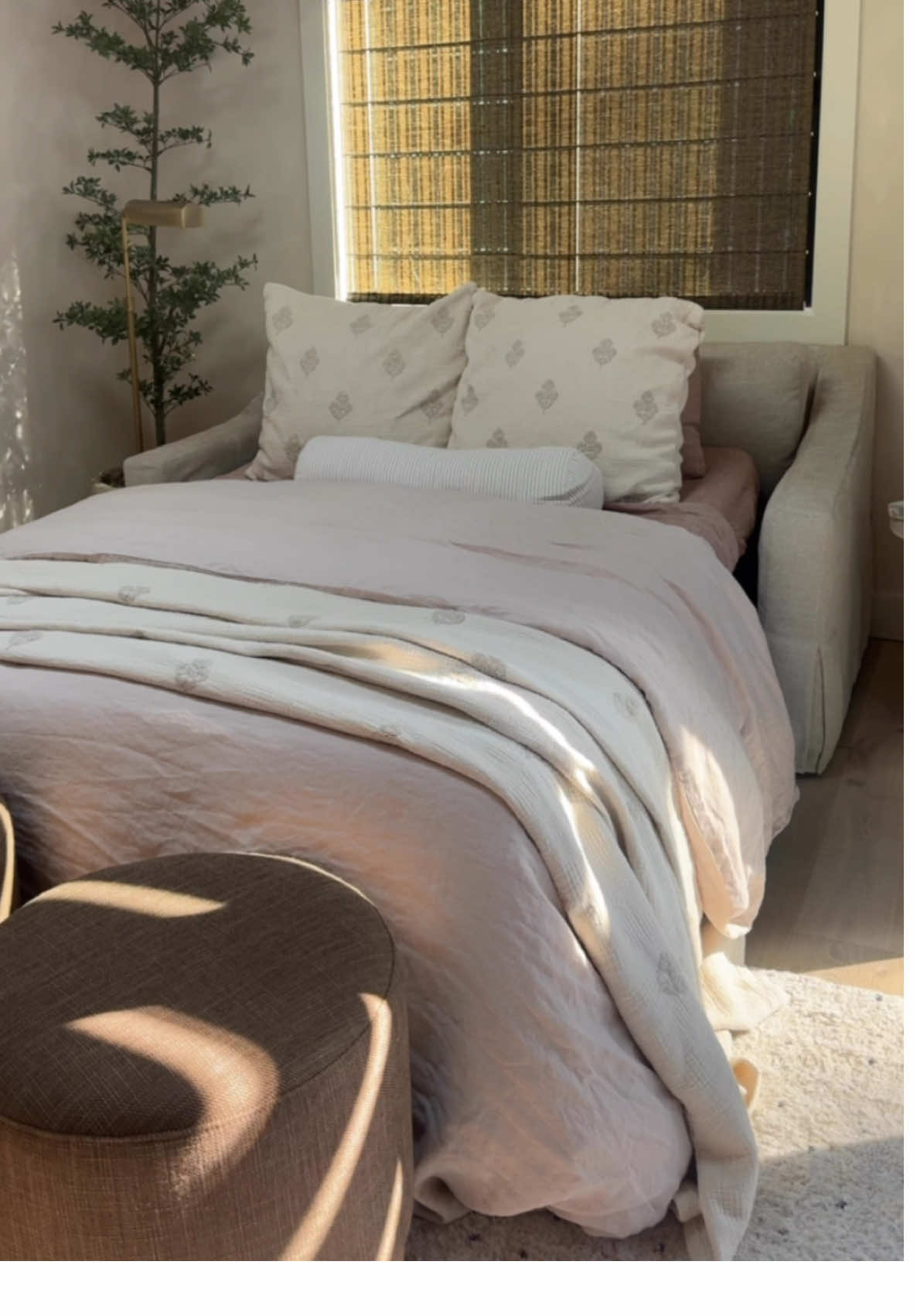 From SheShed office to guest room # Loving how this slipcovered sleeper sofa makes my office double as the coziest little retreat!! Fabric details: • ottoman: Performance Slub Weave Mocha • Slipcovered sleeper sofa: Heathered Tweed Pebble • duvet: rosewater flax linen • bedding: rosewood blush  @potterybarn  #sheshed #officedesign #guestbedroom #sleepersofa #potterybarn #mypotterybarn #bedding #apartmentherapy