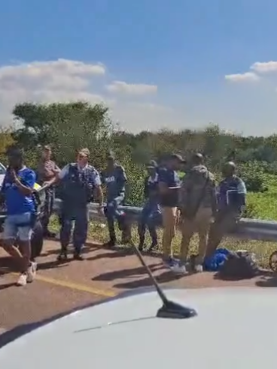WATCH | Police officers, forensic pathologists and emergency services at the Hennops River in Centurion where three bodies, believed to be of the missing constables, were found.  #saps  Video: Thulani Mbele