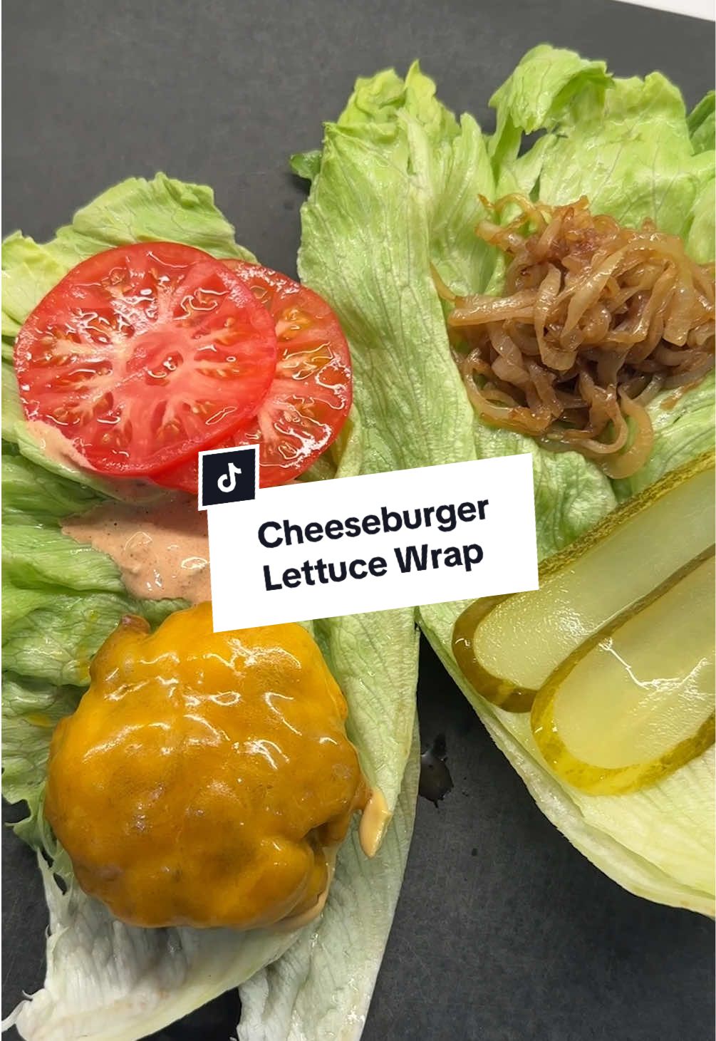🍔 Are you about the lettuce wrap life? If you are looking for easy meals that taste incredible, this is a great high protein lowcarb burger wrap with a healthier homemade burger sauce. Plus, the onions are an unebelviable thing to keep on hand for different meals throughout the week. Here’s how I made it: 1.Start by caramelizing 2 yellow onions. Thinly slice them up and cook low and slow in 1 tablespoons of butter with a couple pinches of salt, stirring often for 25-30ish minutes until golden, then add a splash of balsamic at the end to bring out the color and sweetness. 2.Mix 1 lb ground beef with a few pinches of salt, cracked pepper, 2 teaspoons onion powder, and 2 teaspoons sweet paprika, then shape into 5–6 patties. 3.Cook the patties in a hot pan until golden and crusted, then top with sharp cheddar and let it melt. 4.While those cook, slice your tomato, grab some pickles, and prep whatever toppings you love. 5.For the sauce, mix 2 tablespoons mayo (or thick Greek yogurt if you’re feeling it), 2 tablespoons unsweetened ketchup, 1–2 teaspoons white vinegar, 1 teaspoon smoked paprika, and 1 tablespoon relish or ½ a grated dill pickle—taste and adjust until it’s exactly how you like it. 6.Grab 2 romaine lettuce leaves, overlap them slightly, and cut a slit about a third of the way up from the bottom so you can fold it into four. 7.Fill each quadrant: burger and mustard in one, sauce and tomato in another, caramelized onion in the next, and pickles or other toppings in the last—then fold it up and devour. Didn’t miss the bun one bit.  #shredhappens #lowcarbrecipes #highprotein #lowcarb #keto #ketorecipes #healthyrecipes  #healthyfoodshare 