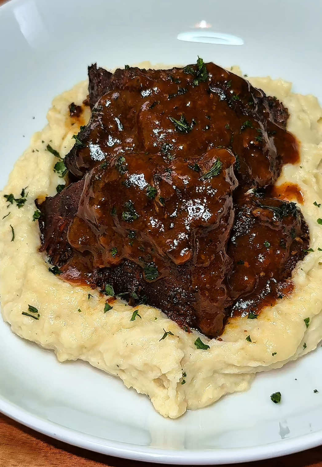 Slow cooked beef short ribs a BOMB 💣 #cookingwithbritt #recipes #shortribs #beef #creatorsearchinsights #blackgirltiktokers🤎 #cookwithme #DinnerIdeas #homecooked #recipes #comfortfood #fypシ #foryoupage #braised #braisedshortribs 