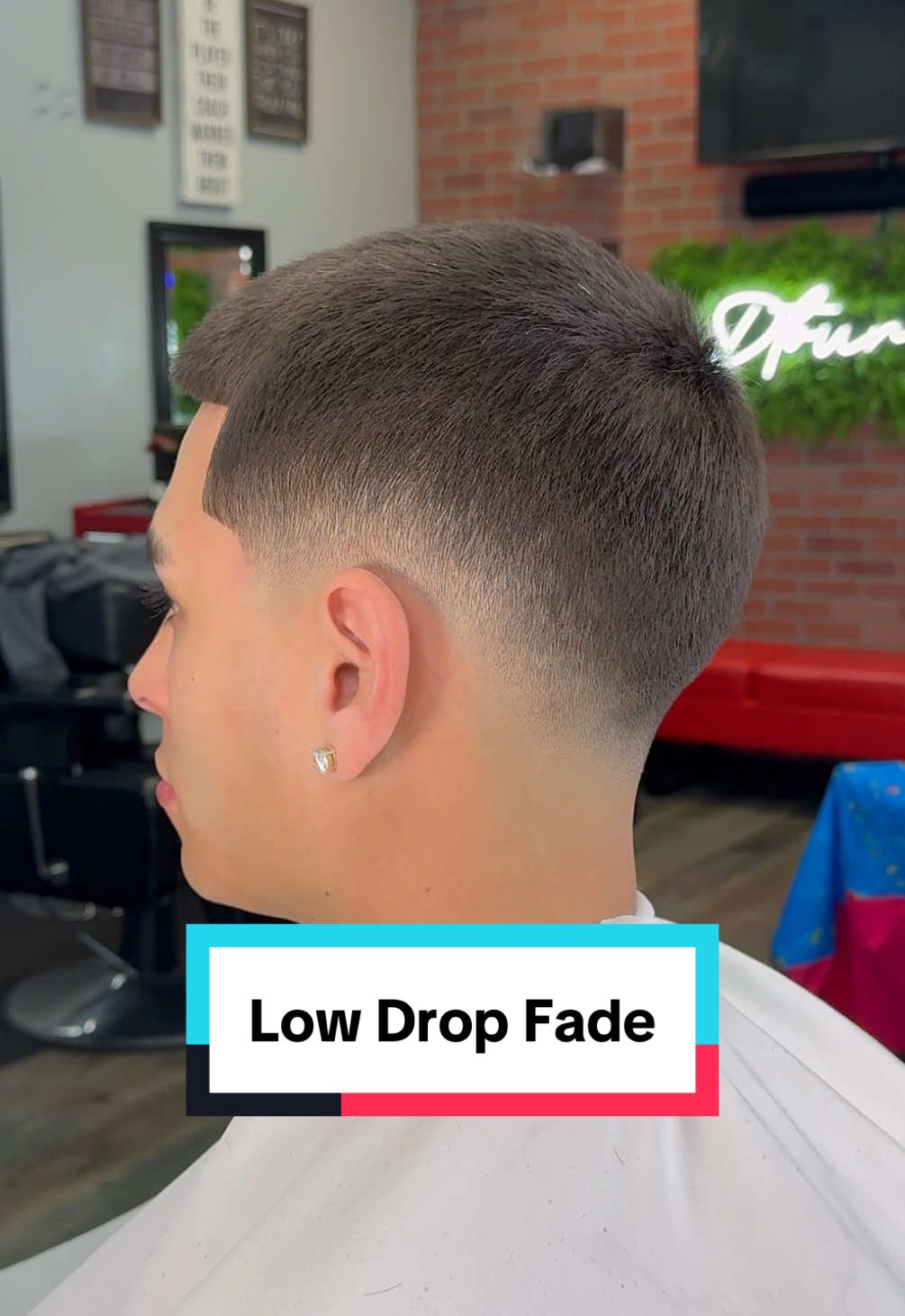 Low Drop Fade  This buzzcut with an 8 guard leaves the hair 1 inch long on the top. The low drop fade offers a trendy yet stylish look by contouring to the shape of his head and adding more contrast between light and dark  #iebarber #midfade #inlandempire #dropfade #buzzcut #trending #viral #fyp #tutorial  
