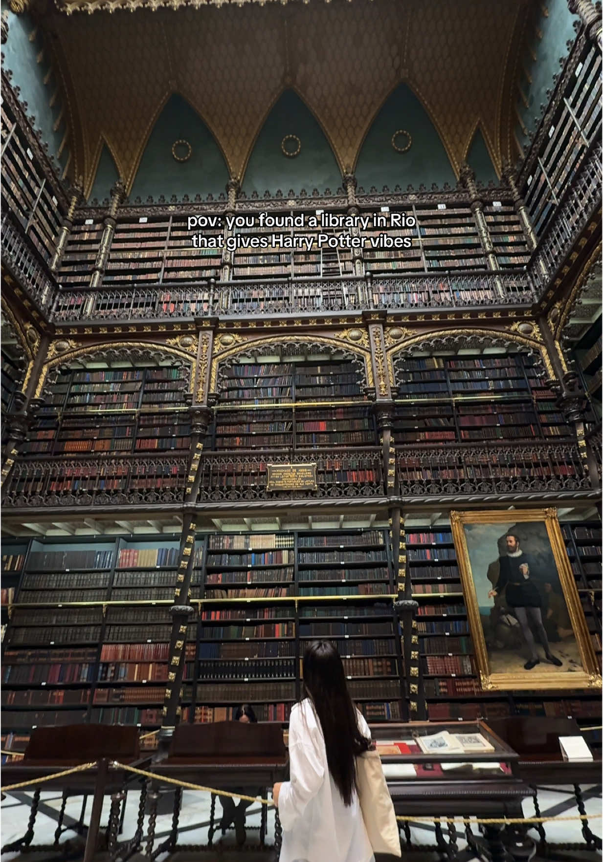 Stepped into this breathtaking 19th century library that houses over 350,000 works including rare Portuguese texts. With its stunning architecture, stained glass skylight, and floor-to-ceiling wooden bookshelves, this literary gem feels more like a palace than a public reading room. Would you visit? Location at the end of the video 📚 #jrxchetravelsbrazil #riodejaneiro❤️ #harrypottertok #potterhead beautiful libraries, brazil travel, rio de janeiro gems, brazil must visit #braziltiktok #riodejaneiro #librarytiktok 