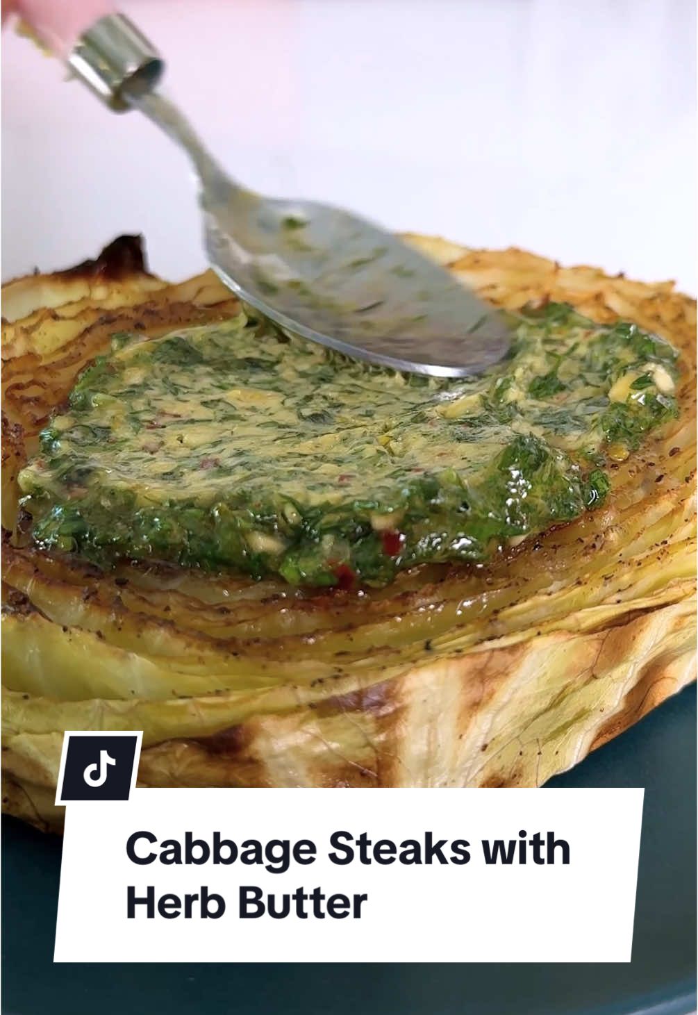 These cabbage steaks are tender and sweet with a herby butter spread on top that seeps into the folds of cabbage, providing flavor to every bite.  Ingredients Cabbage Steaks     ⁃    1 medium head green cabbage (2½ pounds)     ⁃    2 tablespoons extra-virgin olive oil     ⁃    ½ teaspoon ground pepper     ⁃    ½ teaspoon onion powder     ⁃    ¼ teaspoon salt Herb Butter     ⁃    4 tablespoons unsalted butter, at room temperature      ⁃    ¼ cup finely chopped fresh tender herbs (such as basil, chives, dill and/or flat-leaf parsley)     ⁃    3 medium cloves garlic, minced (1 teaspoon)     ⁃    1 teaspoon grated lemon zest     ⁃    1 teaspoon lemon juice     ⁃    1 teaspoon lower-sodium Worcestershire sauce     ⁃    ¼ teaspoon crushed red pepper     ⁃    ⅛ teaspoon salt Directions     1.    Prepare Cabbage Steaks: Preheat oven to 425°F. Line a large rimmed baking sheet with foil. Trim stem off cabbage. Slice the cabbage vertically into 4 (1-inch-thick) steaks. Place the steaks on the prepared baking sheet.     2.    Brush both sides of the steaks with 2 tablespoons oil. Sprinkle both sides with ½ teaspoon pepper, ½ teaspoon onion powder and ¼ teaspoon salt.     3.    Roast until tender and browned, about 45 minutes, flipping halfway through.     4.    Meanwhile, prepare Herb Butter: Combine 4 tablespoons butter, ¼ cup herbs, minced garlic, 1 teaspoon lemon zest, 1 teaspoon lemon juice, 1 teaspoon Worcestershire, ¼ teaspoon crushed red pepper and ⅛ teaspoon salt in a medium bowl. Beat with an electric mixer on medium speed until fully combined, 30 seconds to 1 minute. To access the recipe on our website, go to our profile then click the likeshop link. From there, click on the image that corresponds to this video. #EasyRecipes #DinnerIdeas #onepanmeal #cabbagerecipe #butter 