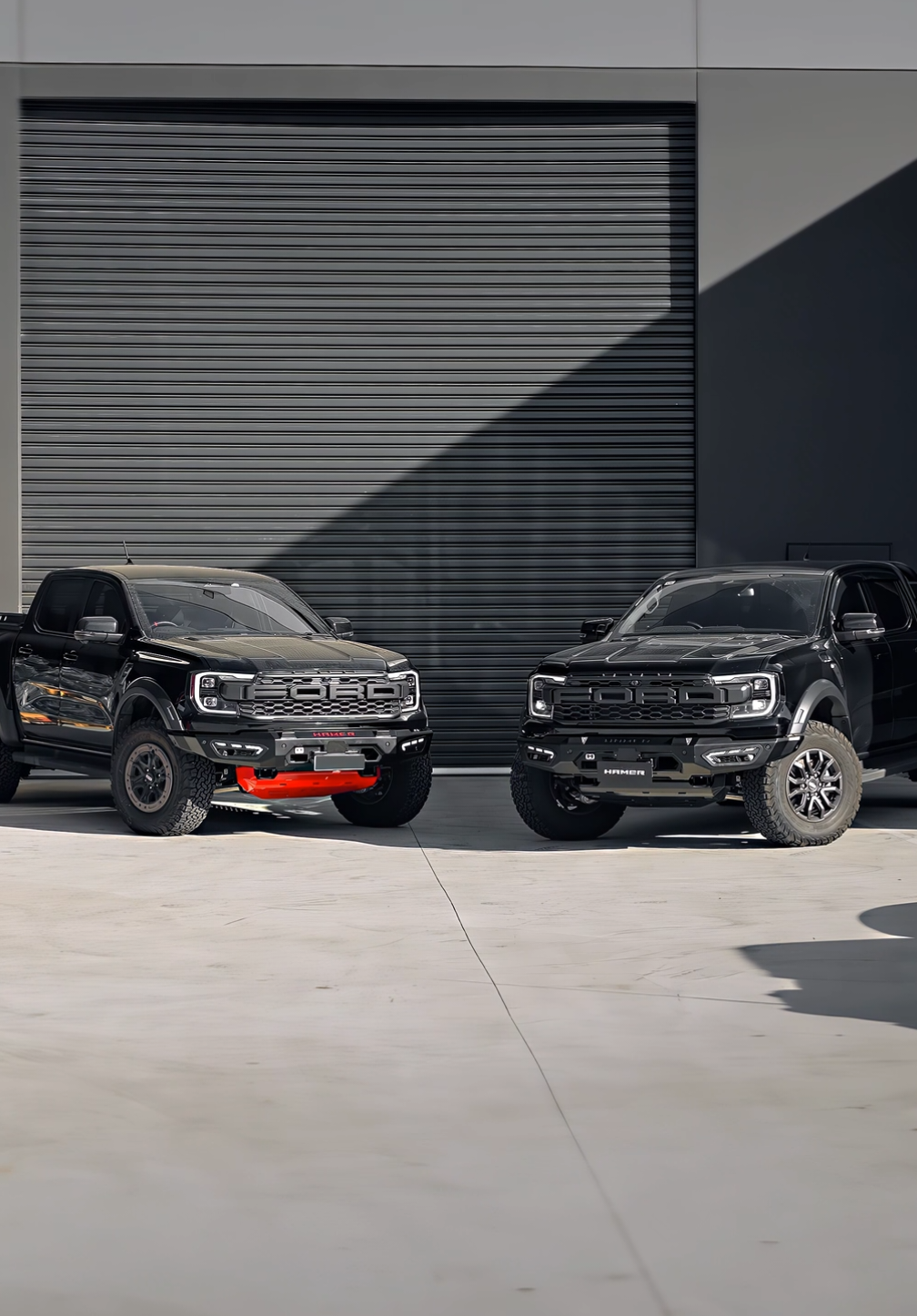 Double trouble never looked this good. 😈🔥 Two Next-Gen Raptors, both rocking Atlas Series bull bars—one flexing bold Hamer red, the other fully blacked out and ready to disappear into the night.  #Hamer4x4 #FordRaptor #OffRoadKings #4wd #4x4 #offroad #camping #outdooradventures #4x4accessories #offroadaccessories #4wdaccessories #FordRangerRaptor #FordRangerRaptor2022 #RaptorGen2 #NextGenRangerRaptor #fordraptor2022 #fordrangerraptorgen2 #raptor2023 #fordtrucks #NextGenRanger #fordraptor #fordperformance #RangerRaptor #bullbar 