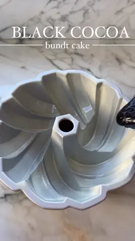 This Bundt cake is probably my favorite version of the black cocoa cake that I’ve made. It’s sooooo soft but sturdy enough to have structure and it came out of the pan so beautifully (besides the piece I broke off 💀lol). . https://baranbakery.com/black-cocoa-bundt-cake/ . #bundtcake #chocolatebundtcake #blackcocoacake