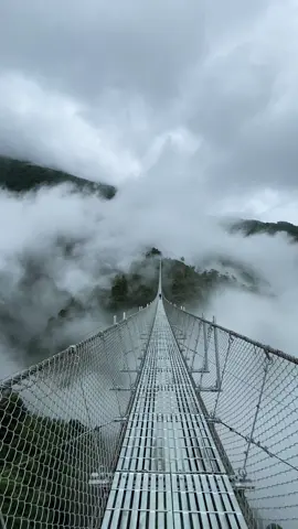 The Sikles suspension bridge, also known as Jhalunge Pul, is a pedestrian bridge that connects Khilang and Parche in the Madi Gaupalika, Kaski, Nepal. It's a way to shorten the trek to Sikles village, offering a scenic alternative to a longer jeep ride around a hill. The bridge is a popular spot for visitors on the way to Sikles, allowing them to experience the local culture and enjoy the views of the surrounding mountains.  #sikles #raining #shreyarai #basanta #nepal #scenery #suspensionbridge #blessed #northabc #trek #northabctrek #nepal #foryoupage #explorenepal #himalayasnepal #naturenepal #treknepal #maya #fyp # #blessed   #nepal : #nepal #naturenepal #beautifulnepal #foryoupage #treknepal #travelnepal #nepaltrekking #fyp: #spreadlove #blessed #blessedview #fypシ #nepal #nepalitiktok #nepalimuser #nepali #nature #naturelover #goviral #kathmandu_muser #butwal_muser #pokhara_muser  #blessed #nature  #peaceandlove #maya #foryoupage #keeploving  #nature #view #nature #fyp≥ #peaceandlove #peace #blessedwiththebest #trending #annapurnarange #pokhara_nepal #explorenepal 
