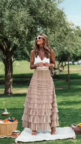 Step into elegance with our gorgeous beige tiered maxi pleated skirt! Made from soft, flowing fabric, the multiple layers of fine pleats create a dreamy and feminine look. Whether you're strolling through a weekend market or attending a garden party, this skirt is your go - to choice for a stylish and effortless outfit. Its versatile design allows for easy pairing with different tops, making it a must - have addition to your wardrobe. #BeigePleatedSkirt #MaxiSkirtTrend #FeminineFashion #StyleEssentials #FashionForward