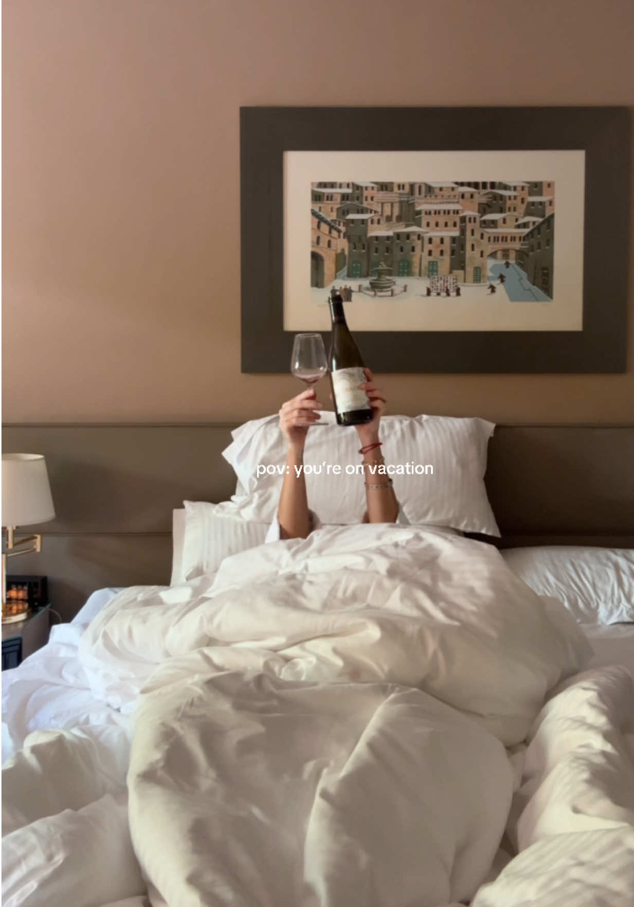 It’s “wine in bed” o’clock in Italy 🇮🇹  #vacationvibes #italy #traveltok #italylife #cheers 