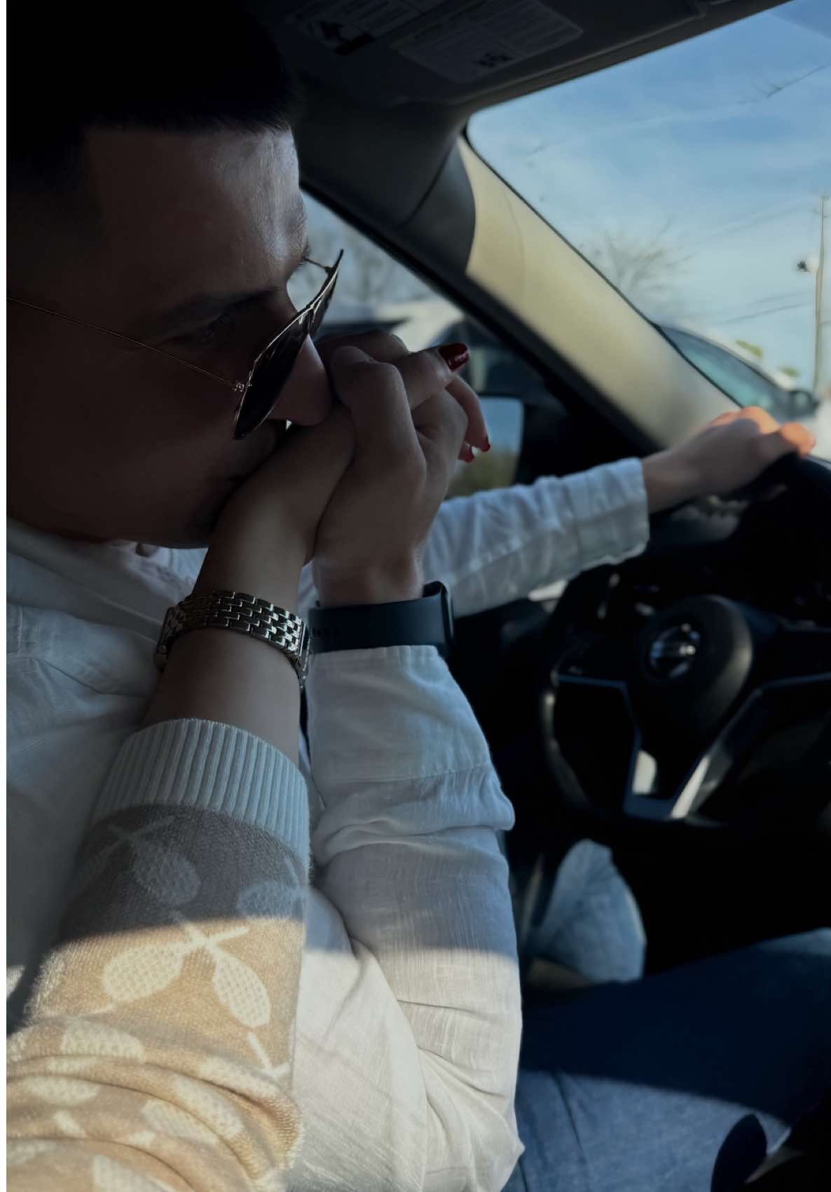 No words. Just a touch that holds the while  world🩶 . . . . . . #LoveInTheAir #HoldingHandsForever #MyPerson #CoupleGoals #ForeverUs #MinimalMood #SoftAesthetic #RomanticVibes #CarMoments #CapturedFeelings