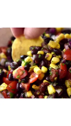 I just suggested this on the newly discovered “Dozer Says” broadcast channel for something to make for NYE, if you want to make an impact. Plain-jane-name - Chorizo, Corn, Black Bean Salsa. Worthy name - Pig Out Salsa. Copycat of a dish I had on a girls’ weekend away. Hidden gem deep within the archives of my website - time for it to shine again!! - N x❤️ PS If you join that channel don’t expect fireworks, I am fumbling my way through figuring out how it all works, not very far in yet 😂 Pig Out Salsa! (Chorizo, Corn, Black Bean Salsa)   1 tsp olive oil 250 - 300 g / 8 - 10 oz chorizo, chopped into small pieces 1 garlic clove, minced 1 cup corn kernels, canned drain or raw cooked 1 cup black beans (from can, drained) 250 g / 8 oz cherry tomatoes , quartered (or regular tomatoes, watery seeds scooped out) 1/2 red onion, finely chopped 1/4 cup finely chopped coriander/cilantro leaves DRESSING: 1 1/2 tbsp white wine vinegar 2 1/2 tbsp olive oil 2 tsp white sugar 1/4 tsp each salt and pepper   1. Heat oil in a large skillet over high heat. Add garlic and chorizo and cook for 4 – 5 minutes until golden all over. Set aside to cool, but not cold (oil will harden). 2. Shake Dressing in a jar until well combined. 3. Place beans, tomato, corn, onion and coriander in a bowl. Pour over Chorizo, including all the oil in the skillet, and the Dressing. Toss and serve! Great at room temp, or lightly warmed. Just make sure fat/oil isn’t solidified from fridge. 