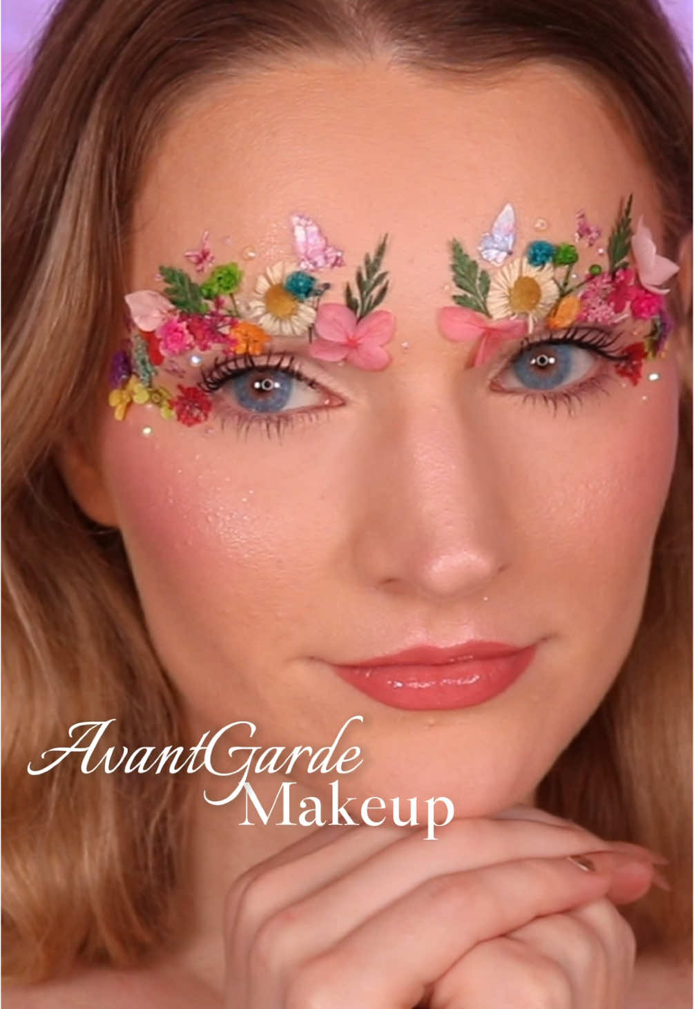 AvantGarde Flower Makeup 💐 @SHEGLAM   - Complexion Pro Long Lasting Matte Foundation  @Morphe Cosmetics   - Under Eye Correcting Concealer in Porcelain 2C - Hot Shot Bronzing Drop in Money Honey @NYX Professional Makeup   - Buttermelt Pressed Powder Blush in Butta Together @hudabeautyshop   - Icy Nude Eyeshadow Palette. Colors:  Avalanche, oneself, Poised.  @PinkyParadise   - Uris Interstellar Blue #sheglam #springmakeup #flowerbrows #editorialmakeup #avantgardemakeup #pinkyparadise #morphe #morphebabe 