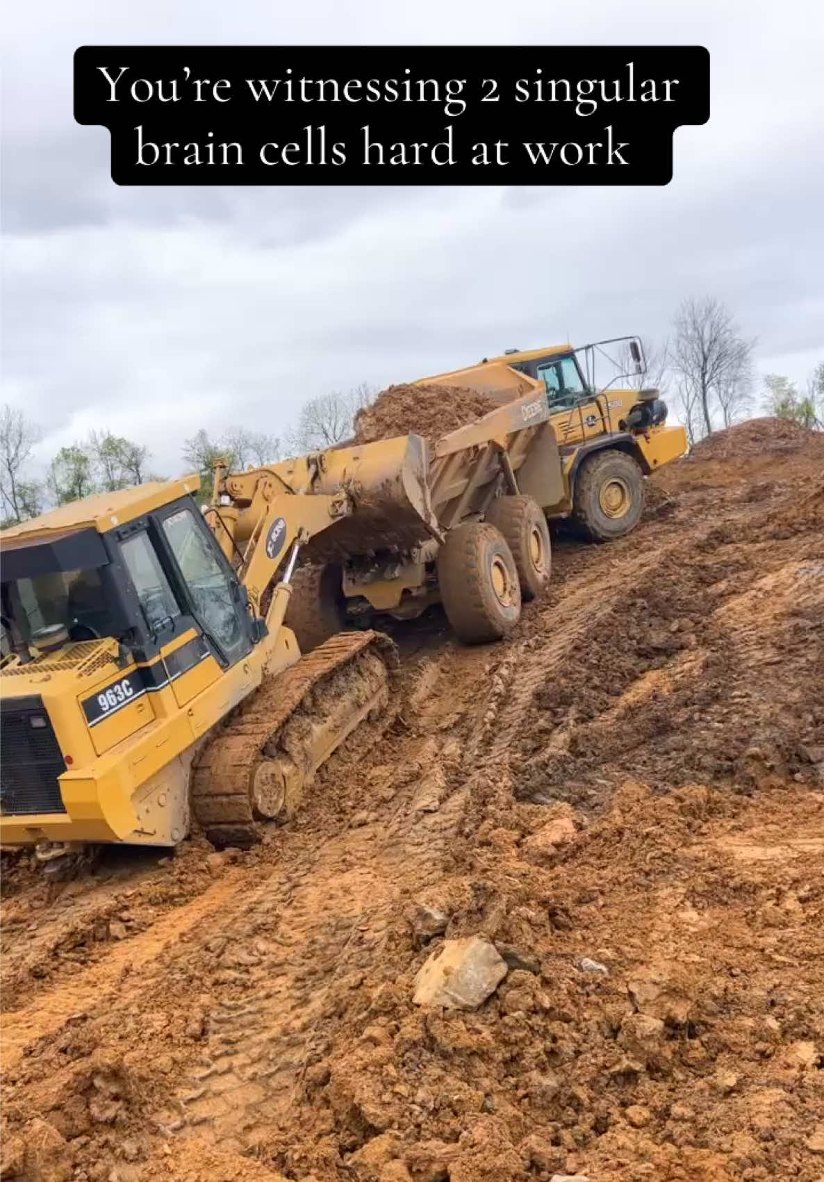 Equipment mud wrestling—$5 a ticket, thanks boss. #foryoupage #fyp #fypシ #constructionlife #heavyequipment #trending #trendingsound #mud 