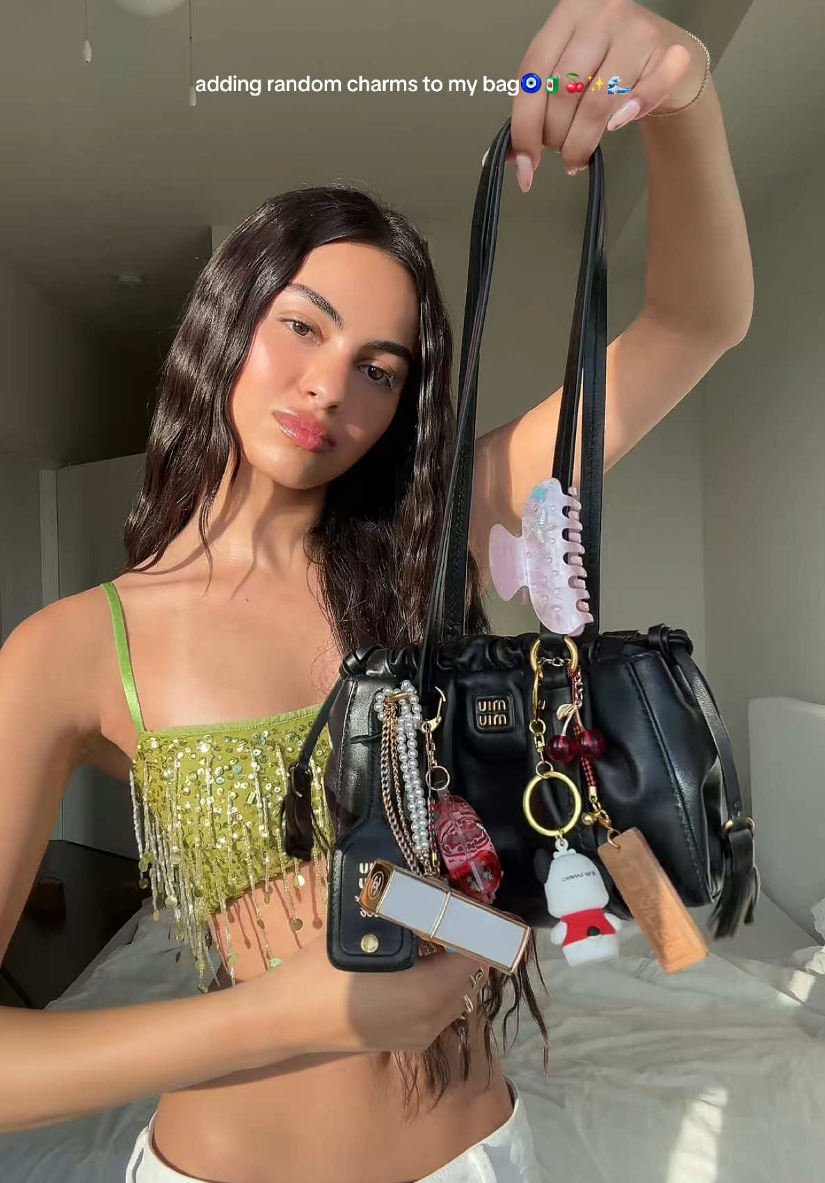 my newest obsession is bag charms 