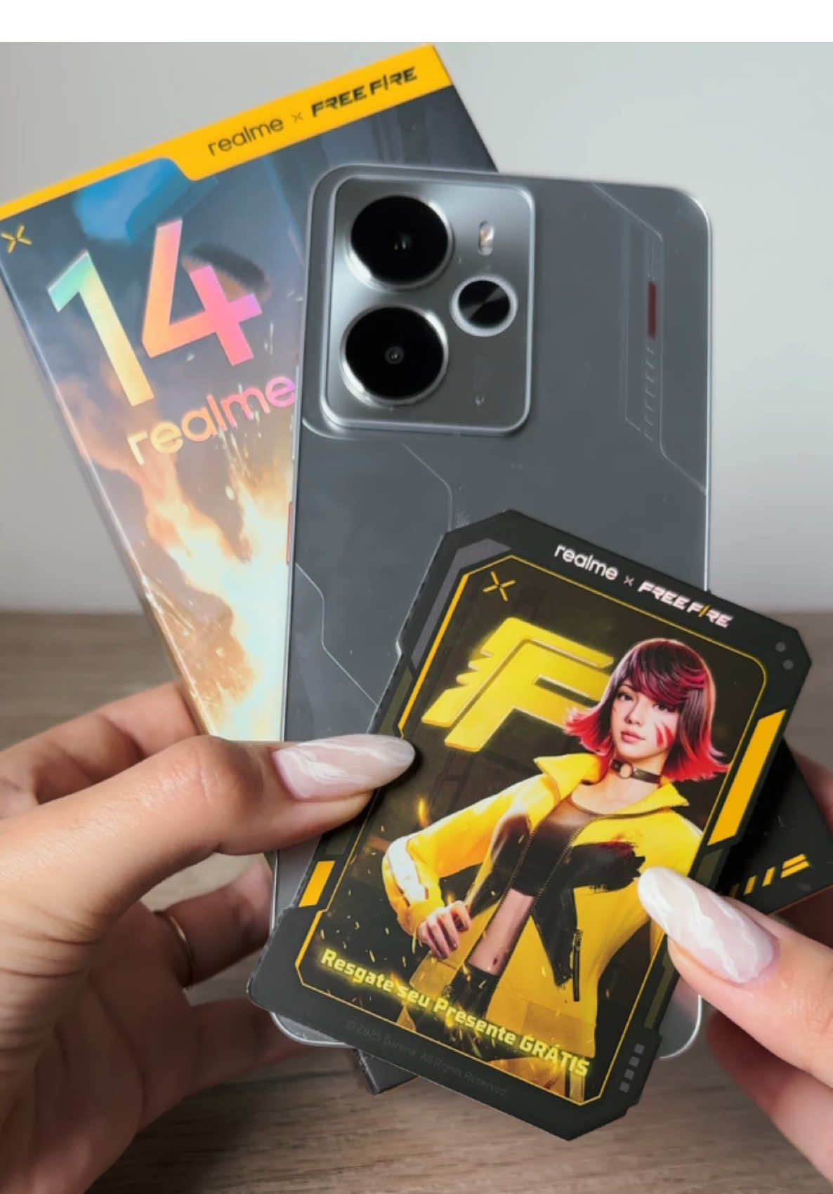 Se você é fã de Free Fire, PRE-PA-RA: o unboxing do Realme 14 5G tá com um mimo que é pra deixar qualquer squad com inveja 😎 #FreeFire #Realme14 #Unboxing #Realme #RealmeBrasil