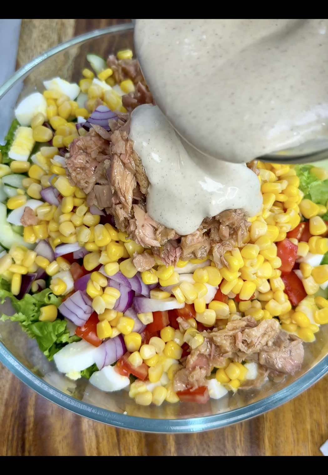 TUNA CUCUMBER SALAD PAR! #busog - Canned Tuna (2 pcs) - Cucumber (2 pcs) - Lettuce (2 stalks) - Tomato - Boiled Egg - Onion - Whole corn kernels Salad Dressing: - Mayonnaise (1 cup) - Salt (half teaspoon) - Ground pepper (half teaspoon) - Sugar (half teaspoon) - Calamansi (juice of 4-5pcs) #tunacucumbersalad #tuna #tunasalad #cucumbersalad #lettuce #salad #saladrecipe  (Adjust according to preference)