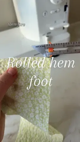If it’s your first time trying a rolled hem foot I recommend using a very lightweight cotton, and testing the foot on a straight rectangle or square. Chiffon, curves and circles come after! Start by measuring the opening of your foot, and trimming the corner of your fabric about the same width. The trickiest part of using the rolled hem foot is starting. You want to feed the fabric through the cone of the foot (the little tube that rolls the fabric over). You can also do this with the help of tweezers or a pin. I like to go slow, and start to gently lower the foot so I can keep the fabric in place while it’s moving through the cone. You want to make sure the raw edge of the fabric is touching the left inside of the foot, and the fabric is folded at the right inside of the foot. Any more or less, you’ll run into trouble. While sewing, I like to hold the fabric between my two index fingers, holding the fabric at this angle seems to help me guide the fabric in easier, and have more control over the width of the curve. Go slow, take a deep breath and keep at it. #teaganjacobs #sewingtutorial #sewingtricks #sewtok #sewinghacks 