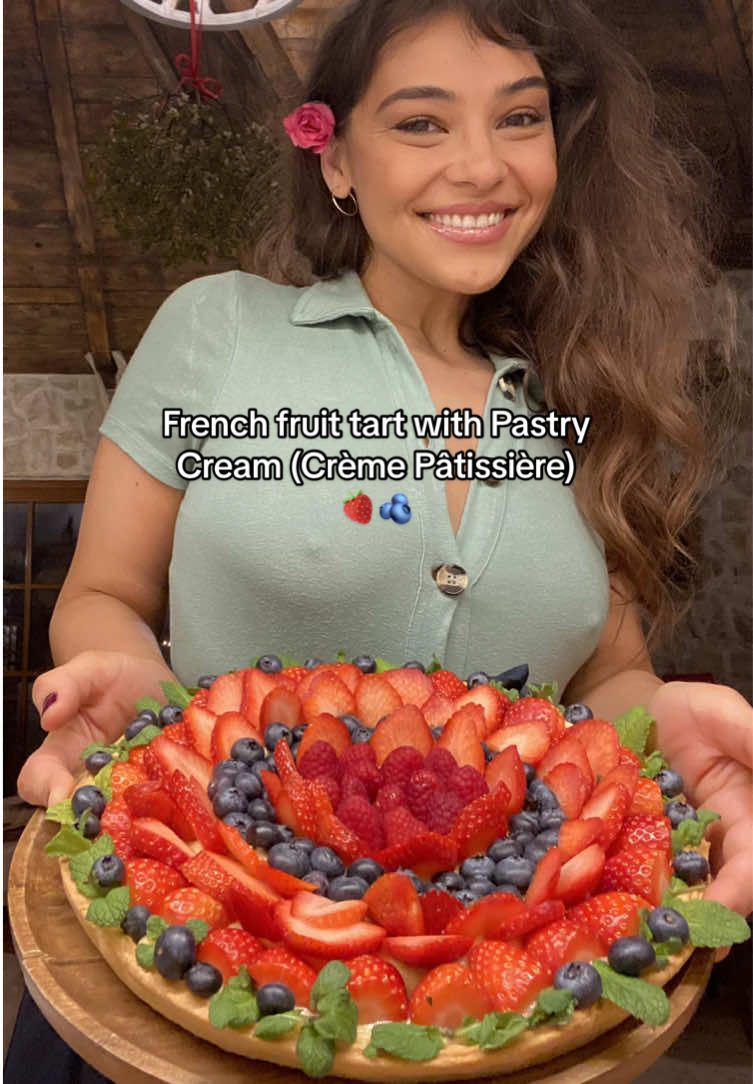 French fruit tart with Pastry Cream (Crème Pâtissière) 🍓🫐 Do you miss summer? What if I tell you summer is at a fork distance from you, with this fruity, elegant but really simple to make, tart. Fresh fruits, silky vanilla cream and crisp crust. Sounds amazing, right? This tart goes along with a cup of coffee or tea in the morning, or a dessert after your meal. For making this amazing french bakery display-worthy tart you would need: For the crust *   1 egg *   300 g flour *   150 g cold french butter *   70 ml water *   Pinch of salt For the filling *   500 ml milk *   6 egg yolks *   120 g of sugar *   40 g of starch *   1 vanilla bean