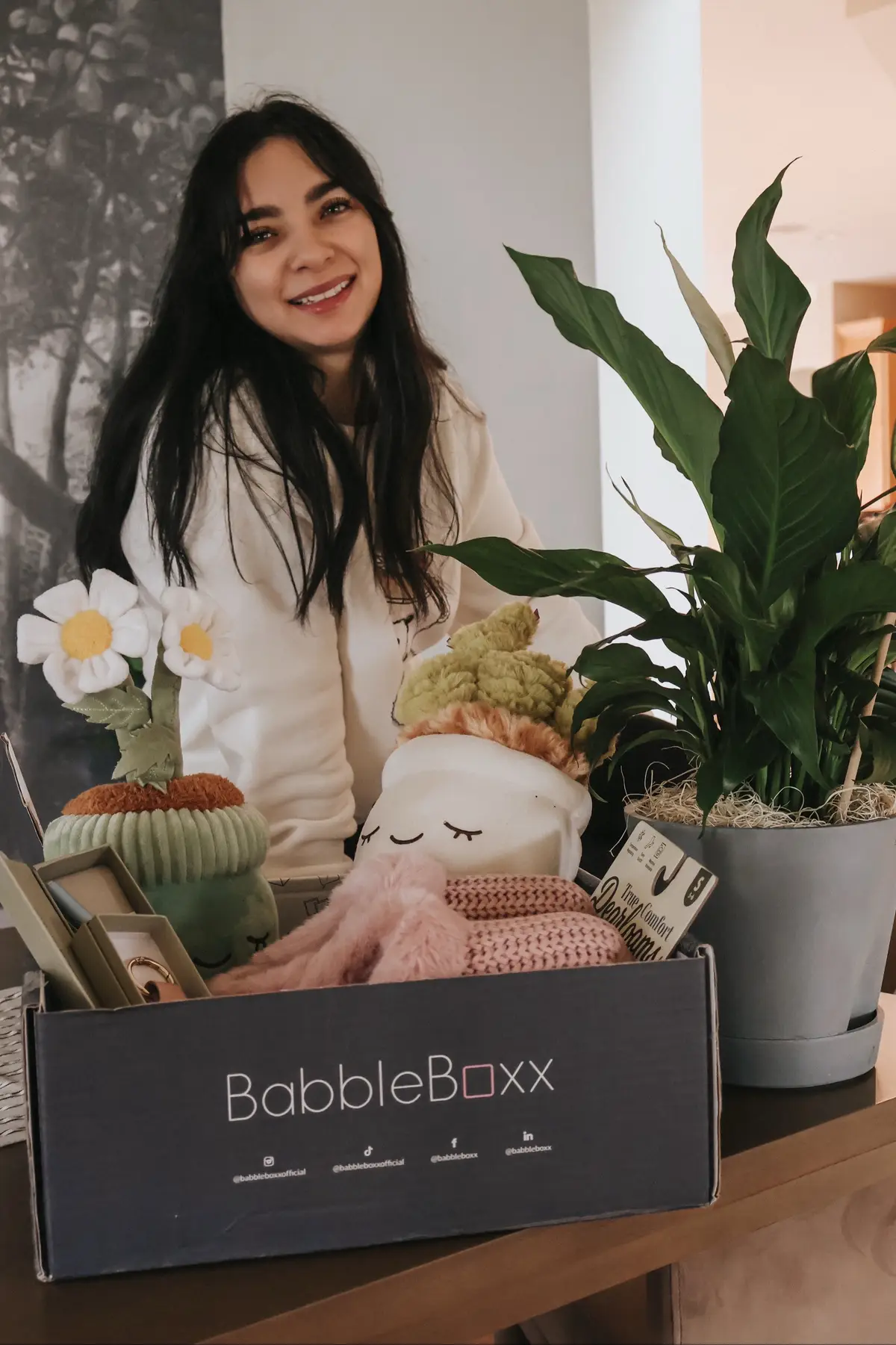 Mother’s Day is coming up and if you’re looking for a gift for the mamas in your life or to for yourself, I have great recommendations right here! 🥰🥰🥰 For the Cozy Mom - These cute, huggable houseplants from @russplush @jazwares come in multiple styles of plants and flowers, and they are made of ecofriendly recycled materials. House plants that never die and you can hug them as much as you want to.  For the plant moms or the moms who love green @bloomscape has gorgeous plants that’s delivered from the greenhouse, straight to your doorstep with eco-friendly packaging and EcoPots made from recycled material! I loved receiving mine even more knowing that it will bloom beautiful lilies. 🪴🌺 The self-watering EcoPot is perfect to make plant care a breeze. Perfect for busy mamas or moms that forget to water their plants often like me . Use code GREENGIFTFORMOM $20 off until 5/11/25 on eligible items. 🥦🥕 #Bloomscape #bloomscapeyourspace  This one , I’m a fan of, I love Dearfoams slippers, they are so comfy and best price you can get, treat your feet to @dearfoams ! The Hannah Clog is on Oprah’s favorite list of 2024! And the colors are just perfect!  They regulate temperature, no matter the weather, to help you stay cozy or cool! The insole memory foam cradles your feet with every step! And we all want ease for us! They are machine washable!Use FORMOM25 saves you 25% off sitewide (expires 5/14/25). 🥿 🥿  And finally for the Mom On-the-Go who loves outings and running around and also works, the Carrie Leather Air Tag Key Fob and the Chroma Gradient Ballpoint Pen from @levenger are amazing gifts. Both come beautifully boxed. The elegant key fob is crafted in luxuriously soft, pebbled Carrie leather, holding your Apple® AirTag® securely inside. The Chroma Gradient Rollerball Pen delivers a fluid writing experience with its lacquered brass barrel and soft silvery gradient finish. It is such a beautiful pen! Use code BABBLE25 $10 off $25+ - Good thru May 16th / For Online Store / $10.00 off entire order (Minimum purchase of $25.00) 🖊️ 🖊️  . . . . . . . . . . #AD #CozyGiftsForMomBBxx #cozymoments #mothersdaysurprise #mothersdaygiftideas❤️💐🎁 #mothersdayweekend