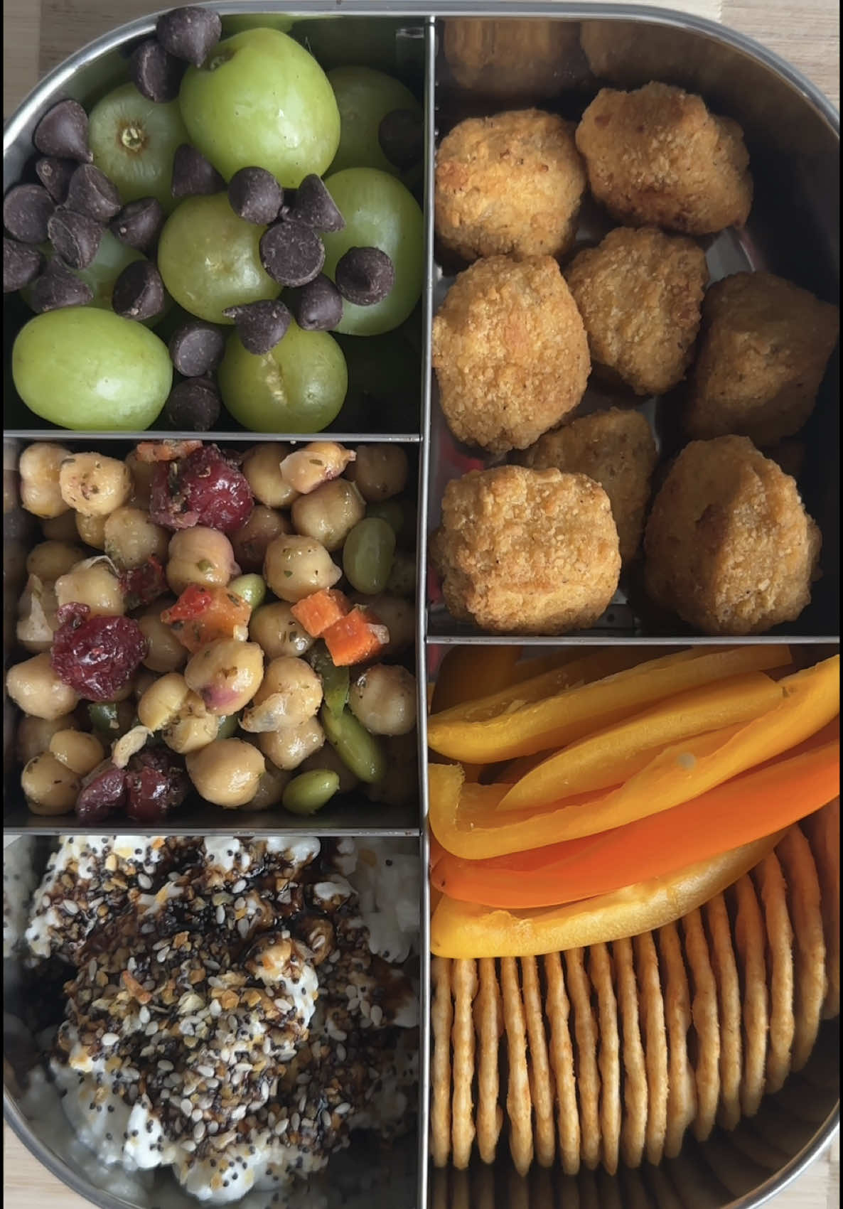 Adult lunchable of the day! You guys wanted a vegetarian version so here you go!! The Tupperware I use is on my Amazon storefront!  Snack box dEATS: - everything rice crackers  - gardein vegan chicken nuggets - bell pepper  - cottage cheese + balsamic glaze + everything bagel seasoning  - cedars foods chickpea salad  - grapes and dark chocolate chips #healthysnack #snackbox  #adultlunchable 