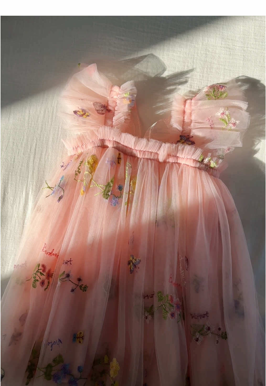 The fabric is soft and flowing and the flowers are all embroidered on🌿💐✨#dresses #baby #babyclothes #babydress #fairydress #dressingbaby #babyessentials #babylove #babytiktok #babytok 