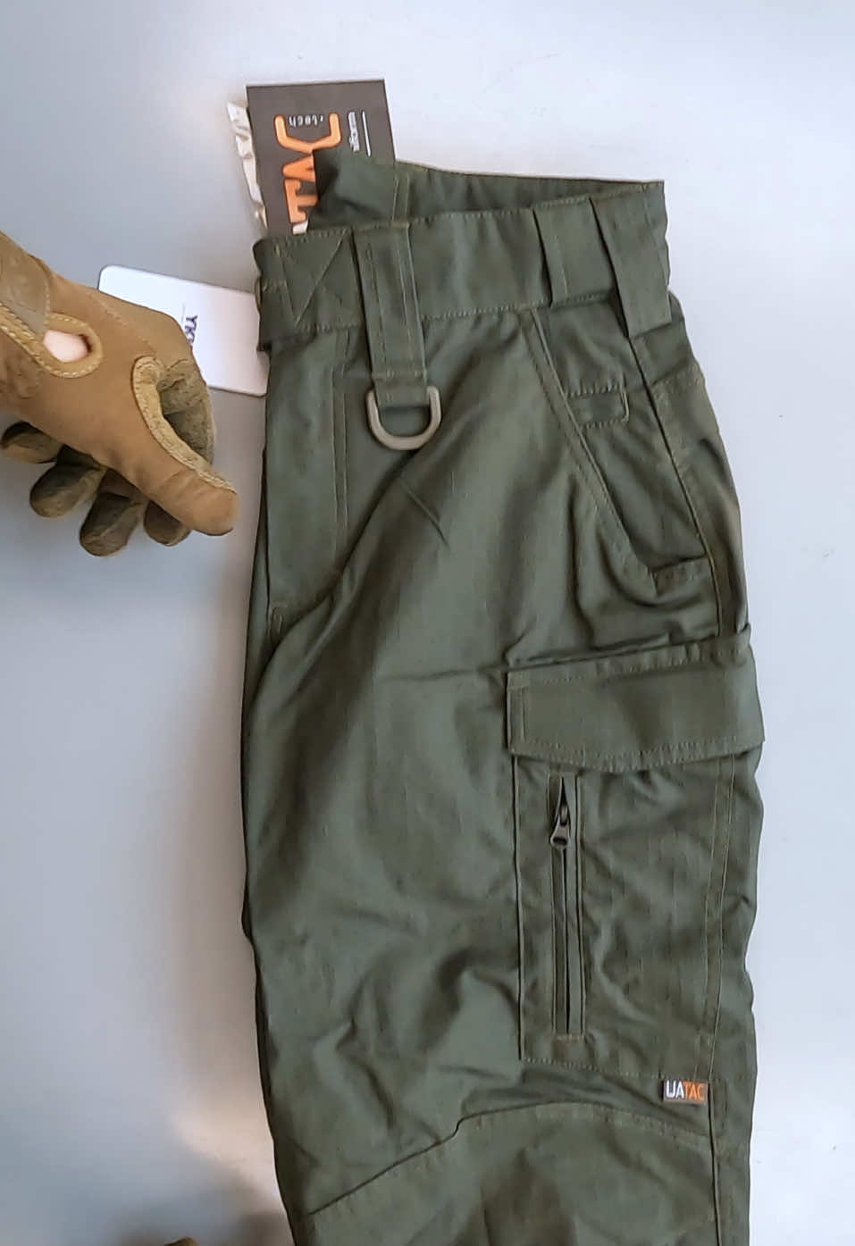 Tactical Pants Lite UATAC | Olive The Lite UATAC tactical pants are designed specifically for the military, have a versatile cut and are suitable for a variety of conditions of use - training, shooting range, work or walking. The fabric consists of 65% cotton and 35% polyester, which makes it pleasant to the touch and resistant to tearing and damage. Ripstop weaving will prevent the pants from tearing even under heavy loads #тактичніштани #штанизнаколінниками #тактичнийодяг #бойовашкара #військоваструя #формаЗСУ #страйкбол #зсу #славаукраїні #героямслава #combatpants #tacticalpants #kneepadpants #militarygear #tacticalwear #airsoftgear #combatready #armylook #ukrainianarmy #warfashion #fyp #viralvideo #supportukraine 