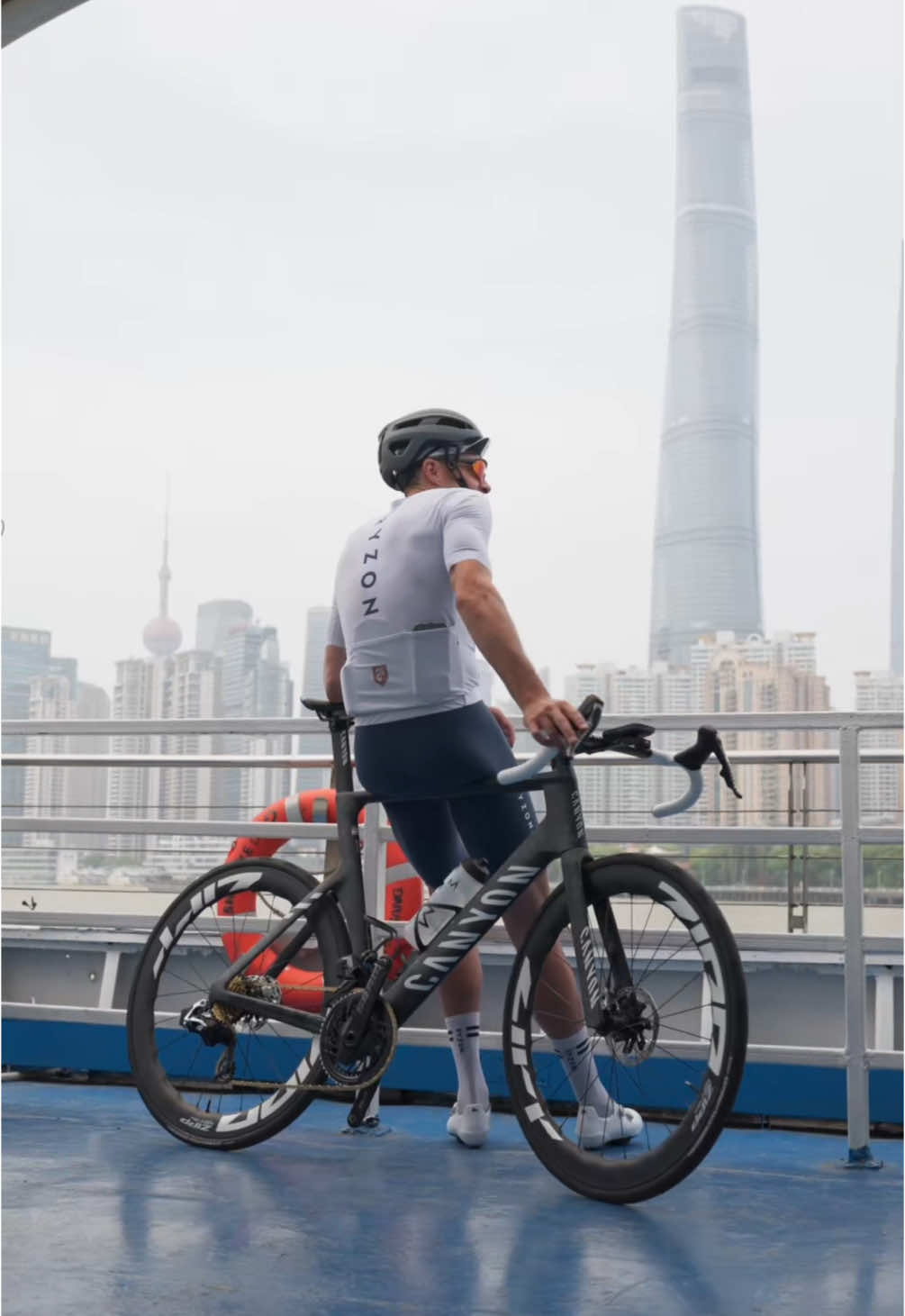 Turn the volume up 🔊   The wheels. The streets. Shanghai, unfiltered with #JanFrodeno 🏙️   #MyCanyon #AeroadCFR 