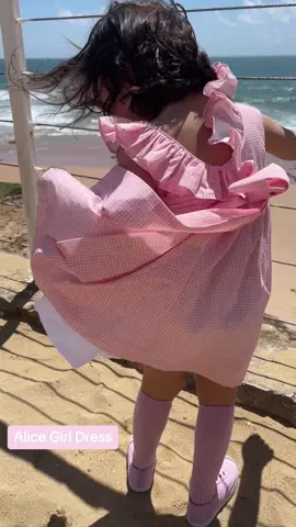 The Alice Dress on a windy day 🌪️🩷 #BeatriceandBee #childrenswear #girlswear #girl #pink #gingham #Summer #dress #SS25