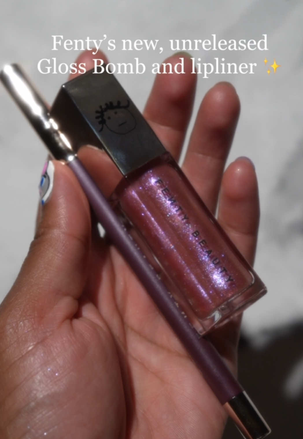 Fenty’s new unreleased Gloss Bomb and lipliner✨ Meet Grape Splash and Bored Heaux, the new gloss bomb and lipliner from Fenty that were available at the Gloss Bomb Pop-Up! What do you think?! I hope the gloss bomb will end up being widely released! @Fenty Beauty  #trendingmakeup #viralmakeup #viralreels #sparklymakeup #fenty #fentybeauty #glossbomb 