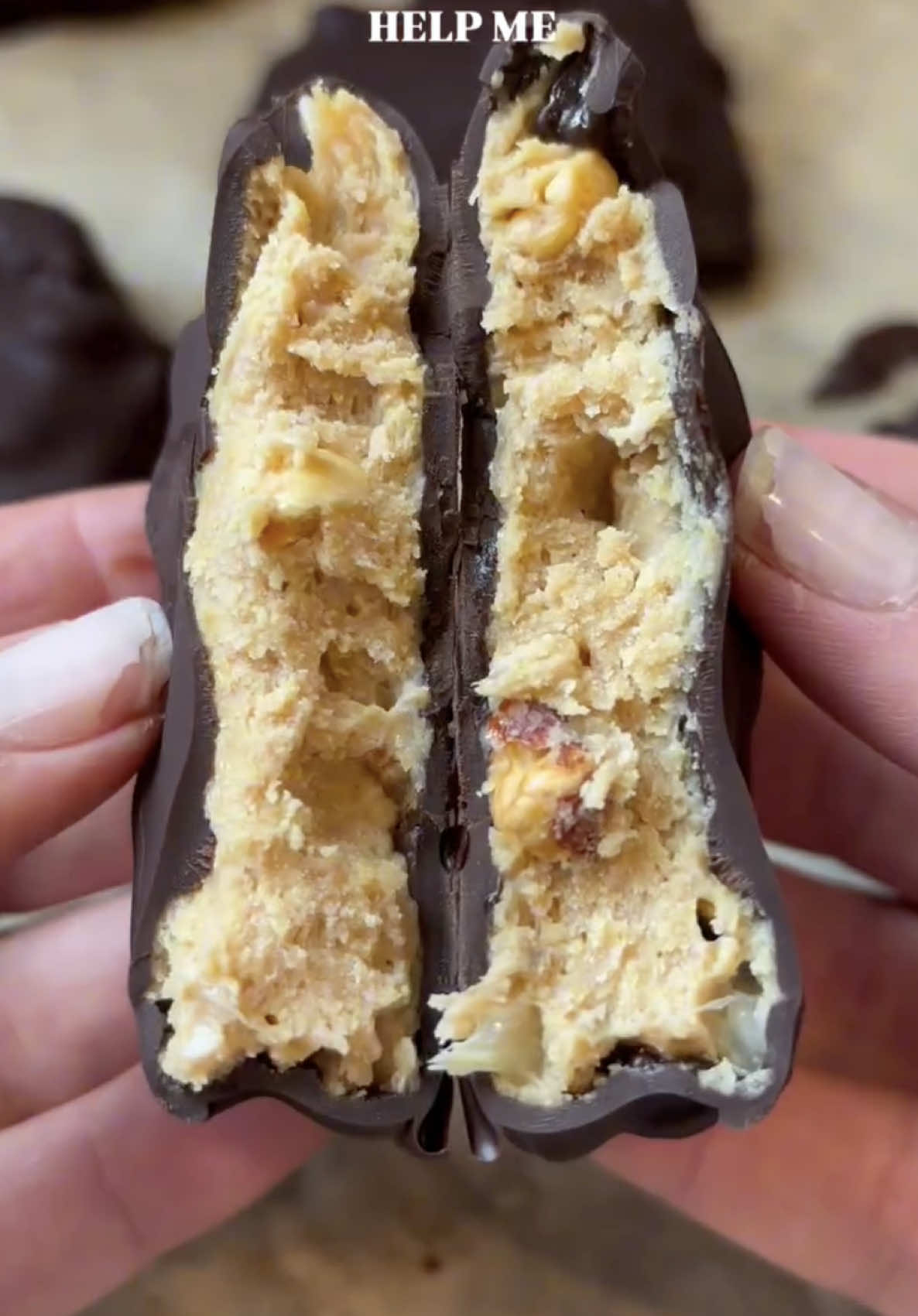 Peanut Butter Chocolate Discs by @Jenn | The Home Chef Momma 🥜 🍫 Get the recipe below / at the link in bio and keep tagging #feedfeed for a chance to be featured.  INGREDIENTS: 1 ripe banana, mashed 1 c. creamy peanut butter 1/8 c. honey 1/3 c. peanuts 1/2 c. whole milk Greek yogurt,plain 12oz dark chocolate, melted Flaky sea salt, optional RECIPE: 1. In a medium bowl, mix together mashed banana, peanut butter, honey, peanuts, and plain yogurt until fully combined. 2. Spoon mix onto a parchment lined baking sheet (makes 10-12) and then flatten into a disc shape. 3. Put in freezer for about an hour until fully hardened. 4. Remove from freezer and completely coat in melted chocolate. Place back onto parchment paper and sprinkle with sea salt if desired. Return to freezer for a few minutes until hard and enjoy! 5. Store in a freezer safe container in the freezer. #feedfeed #healthysnack #nobake #chocolate #easysnackidea #peanutbutter #frozensnack 