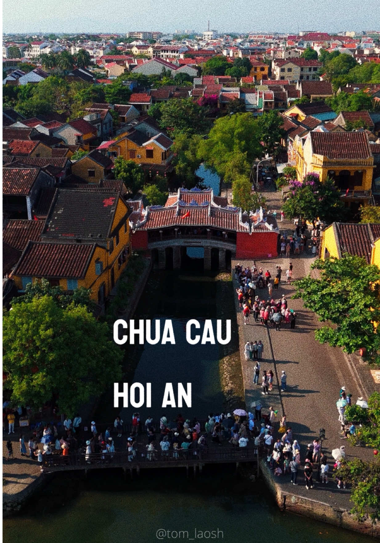 The Japanese Bridge in Hoi An is more than just a pretty landmark - it’s a symbol of cultural connection. Built in the early 1600s by the Japanese community, this covered bridge was meant to link them with the Chinese quarter across the river. It even has a small temple inside, dedicated to the god of weather and earthquakes. Watch as this timeless structure glows in the golden light of Hoi An’s ancient town. #japanesebridge #hoian #chuacau #dulichvietnam #flycamvietnam #ancienttownhoian #travelvietnam 