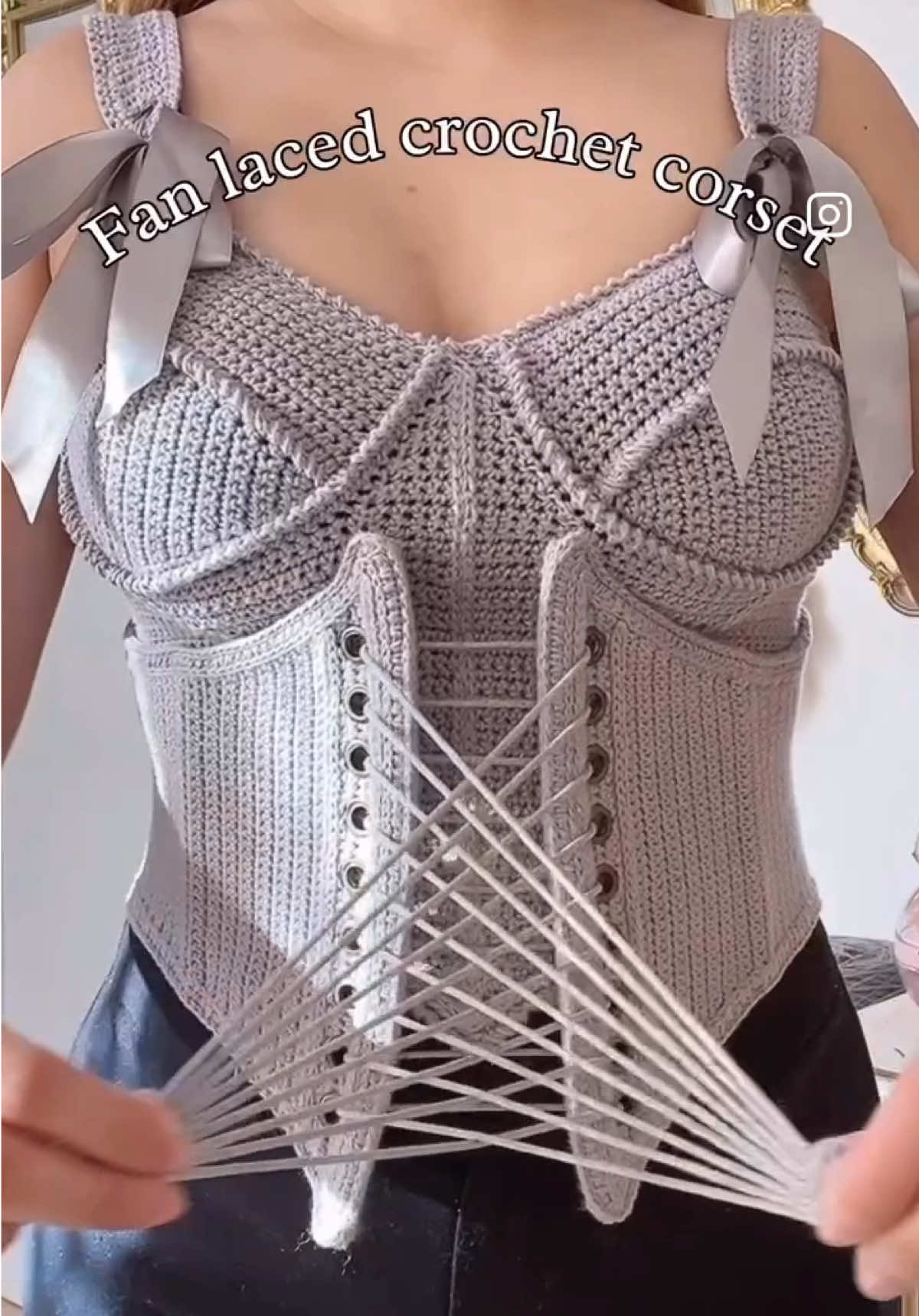 🔥 I’ve completed my second prototype of a fan-laced crochet corset. This time, I incorporated synthetic whalebone as a type of corset boning, which is better than the spiral steel boning I used in my first version. It looks more structured than my initial attempt. The boning is securely stitched underneath the corset using a boning tunnel/casing. I used a sturdy wax cord that can withstand pulling for the lacing. I paired it with my freehand crocheted bustier top. This corset is for aesthetic purposes only and is a statement piece in your wardrobe. It will not function as a traditional corset because it is a crocheted version with added structure.  The crochet pattern will be available for purchase soon! It is currently in the testing phase. Thank you so much! ❤️ Yarn by @ashleyscrochetph  #crochetaria #modacroche #graficosdecrochet #crocheteria #crochet #crocheter #crochetersofinstagram #crochetpattern #crochetdesigner #crochetpatterndesigner  #handmade #crochetcorset #corset #gantsilyo #gantsilyophilippines #gantsilyogang #fiberartist