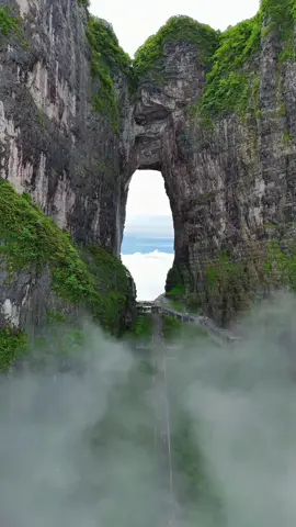 Viewing the Tianmen Cave wonder at Tianmen Mountain in Zhangjiajie up close.#ChinaTravel #Zhangjiajie #fyp #amazing #avatar 