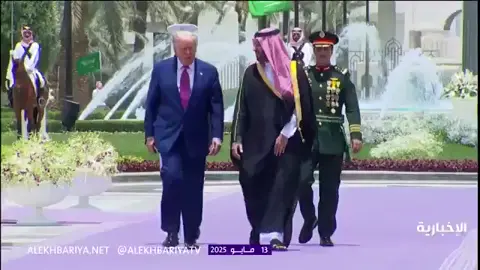 Saudi Crown Prince Mohammed bin Salman and US President Donald Trump walk towards Al-Yamamah Palace where the leaders will hold bilateral talks