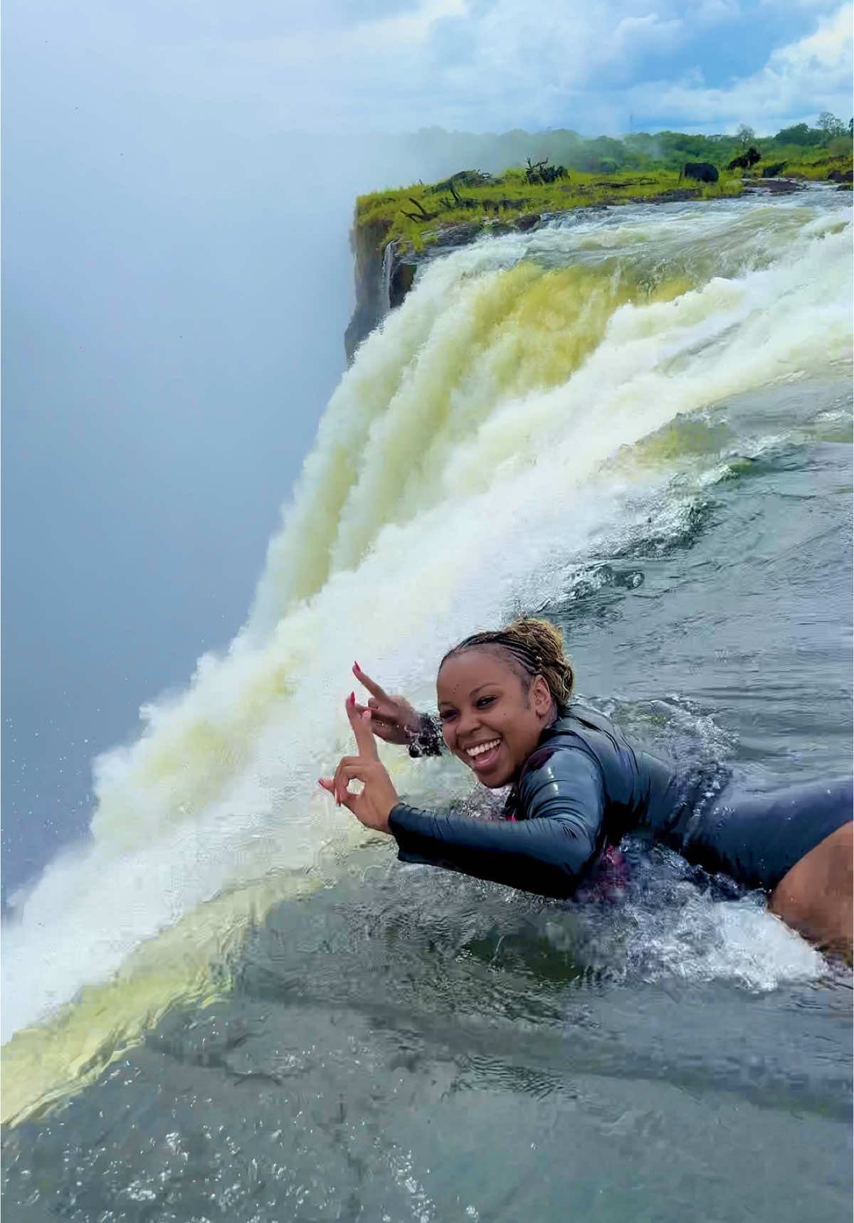 Literally living at the edge. Adrenaline junkie living my best life.. I would do it a hundred times over so y’all can keep hating  #devilspool #zambiantiktok🇿🇲 #creatorsearchinsights #foryoupage #trendingvideo #victoriafalls #victoriafallszimbabwe #whatislife #adrenaline #victoriafallszambia 