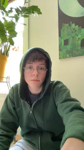 White Woman Whisperer is amazing. I learn so much from her. Video description: I am sitting on the floor and talking to the camera. The room is lit by a window beside me. A potted plant in a tall metal stand reflects the bright yellow of its pot and the green of its leaves onto the sill and sash of the window. The corner of a painting is in view above my head and to one side. It depicts a pile of green rectangular shapes reminiscent of a tumbledown ruins. I am a middle aged white woman with short brown hair and glasses. I have dark eyes and long thin hands I gesture with while speaking. I am wearing a forest green hoodie with the hood up and gray sweatpants #estranged #community #teaching #disability #chronicillness #accountability 