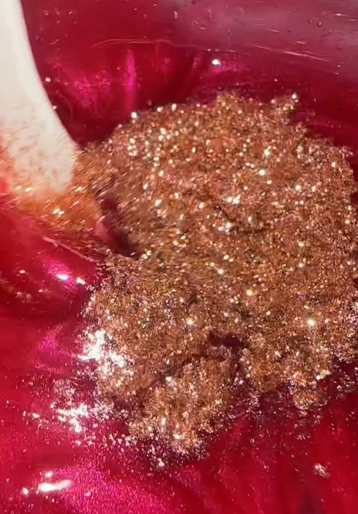 Replying to @Sara & Prince let’s Make a red lip gloss with gold reflect. This is shade Kiss Me. #makeinglipgloss #lipglossmaking #BeautyTok #mateobeautycosmetics #shimmerlipgloss 