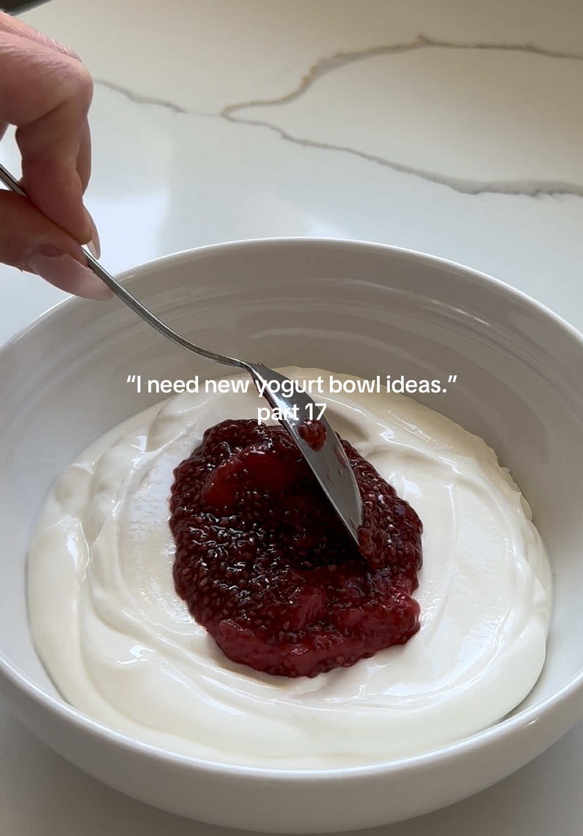 this received a 10/10 from my mother…which is phenomenal btw!!!!🍓 you’ll need: - 5 medium strawberries  - 1tbsp chia seeds  - 1tsp honey - 1/3cup oats  - 1tbsp chopped mixed nuts  - 1tbsp maple syrup  - any greek yogurt you like - 1tbsp desiccated coconut to serve  method: 1. combine roughly chopped strawberries, chia seeds and honey in a small bowl and microwave for 3 minutes stirring every 30 seconds. leave to one side to thicken.  2. meanwhile, toast oats and nuts in a pan for a few minutes before adding maple syrup. cook for another few minutes until you have formed a crisp granola.  3. layer yogurt in your bowl, followed by a dollop of the strawberry chia jam, and top with your homemade granola.  4. finish with some desiccated coconut as it is DELISH! enjoy🍓☺️  #yogurtbowl #yogurt #Recipe #breakfastideas 