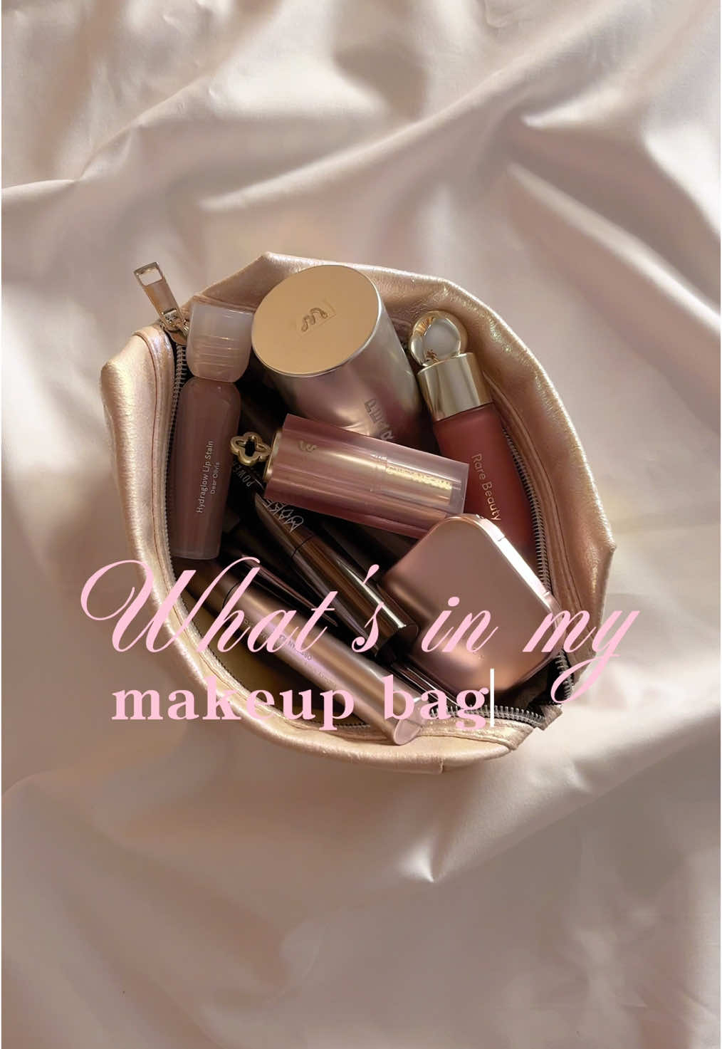 what's in my makeup bag 👛👜 #makeup #makeuppouch #makeupbag #makeupproducts #aesthetic #girlsthings #whatsinmymakeupbag #bellahadid #rarebeauty 