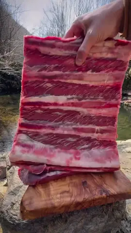 Grilled spare ribs in mud in the wild 🥩🪵🔥💦🌲 #cookingasmr #outdoorcooking #Recipe #leon #cookingnature #camping #foodtiktok #cooking #grilled #ribs 
