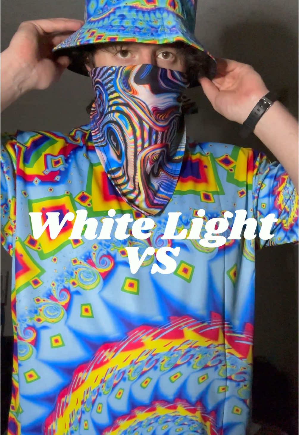 Ever seen a clothes do this? 🤯 #trippy #illusionart #psychedelicart #fyp #festival #festivalfashion #edm #lightreactiveart 